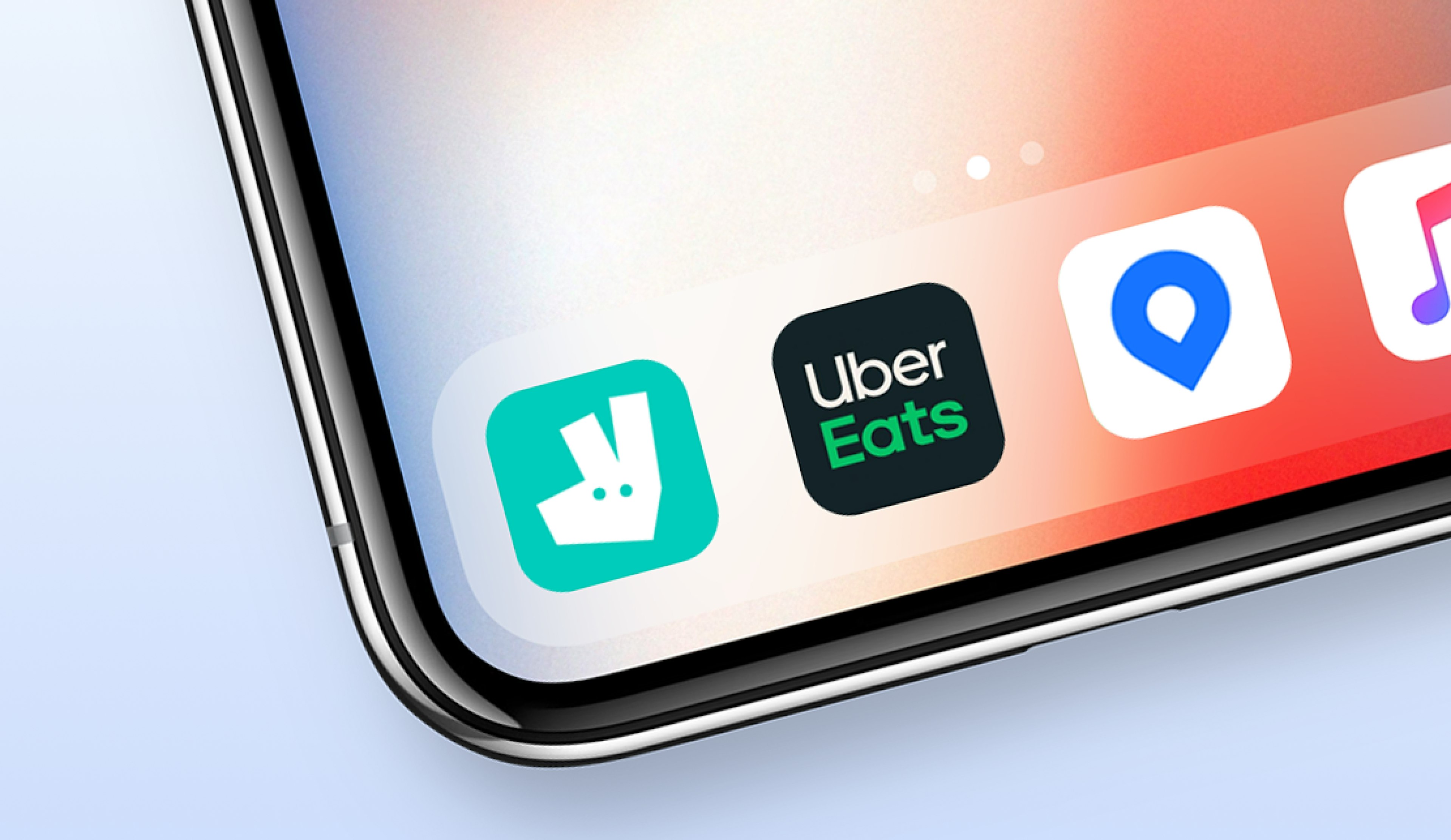 An iPhone with the following apps icons: Deliveroo, Uber Eats, and Circuit