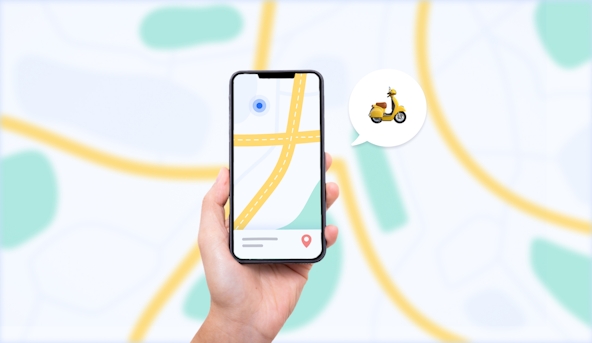 Close-up hand holding an iPhone displaying an example of direct to consumer delivery, including map with a rider on the route.