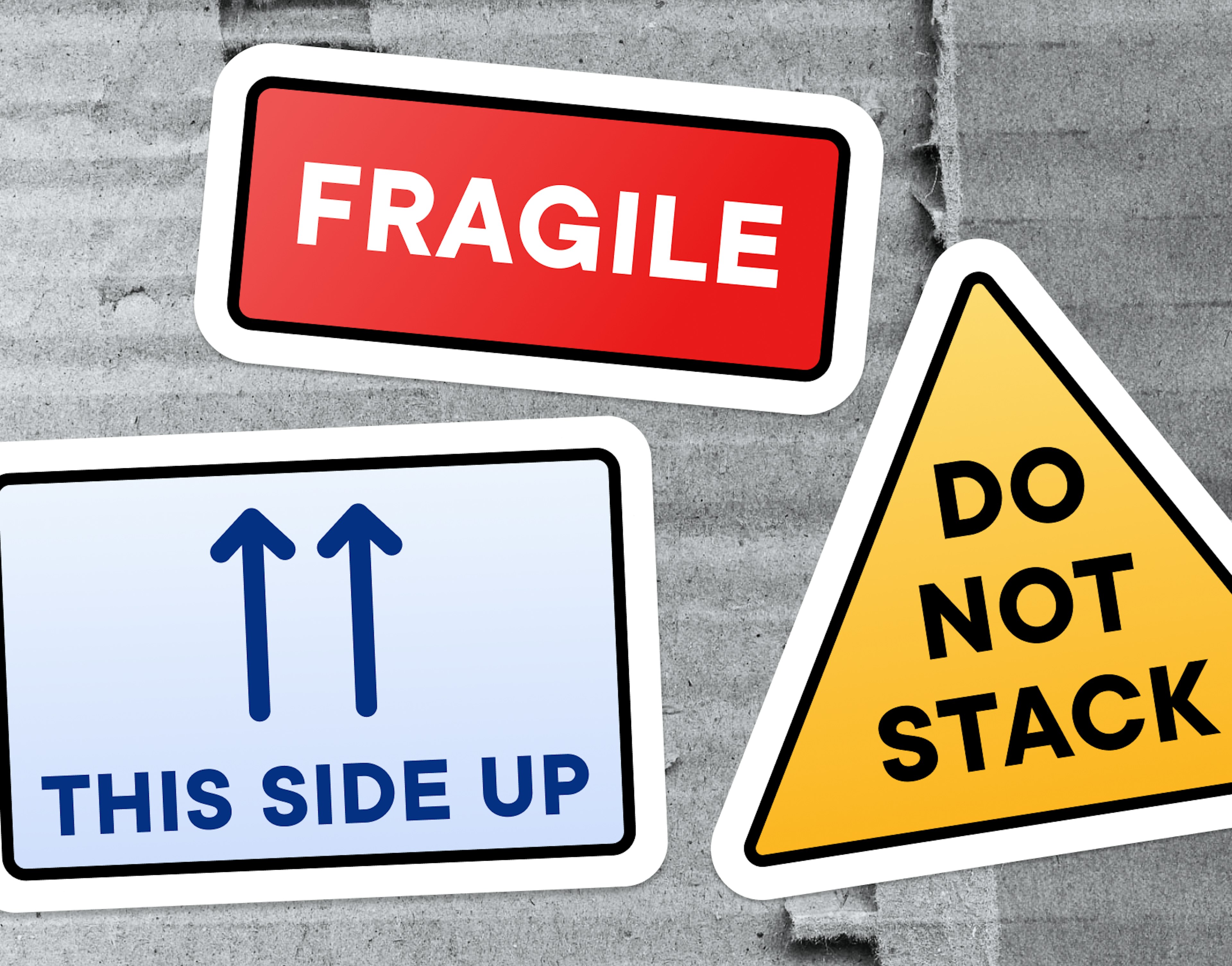 Hazard signs, including, This Side Up, Do not Stack, and Fragile