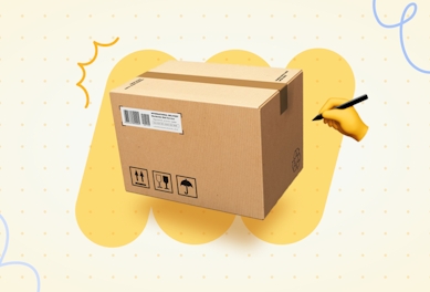 What is a packing slip? Cardboard box being written on by an emoji hand holding a pen