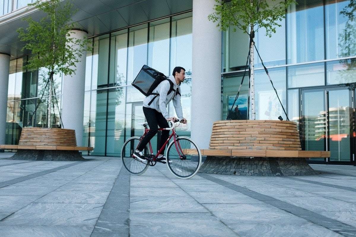 Image of a delivery man on a bike