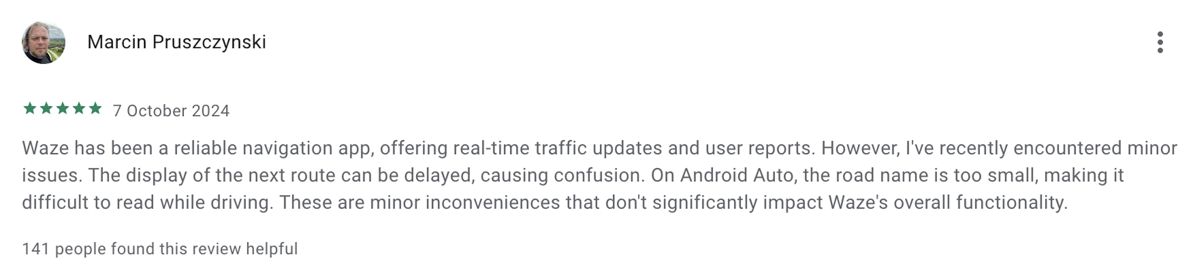 Waze user review mentioning real-time traffic updates and minor issues