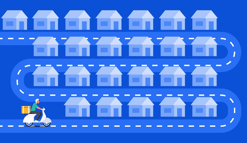 Birdseye view of 25 houses with a road around them. On the road is a delivery driver on a moped.