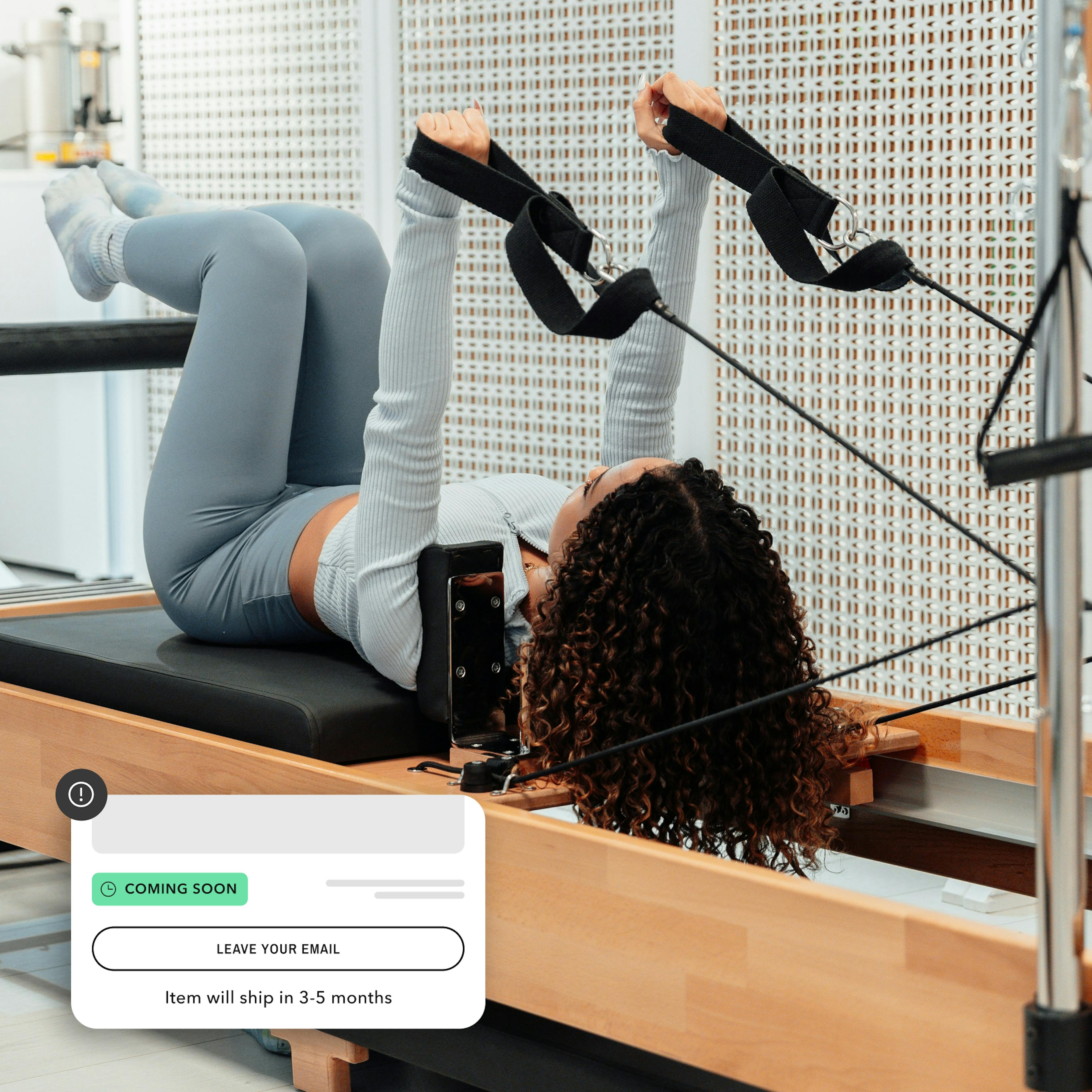 Woman on high-end pilates reformer wellness equipment and "leave your email" box on Shopify product page saying item will ship in 3-5 months