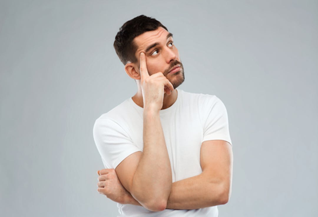 man looking confused and thinking hard