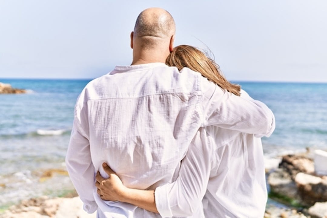 women with bald man in love