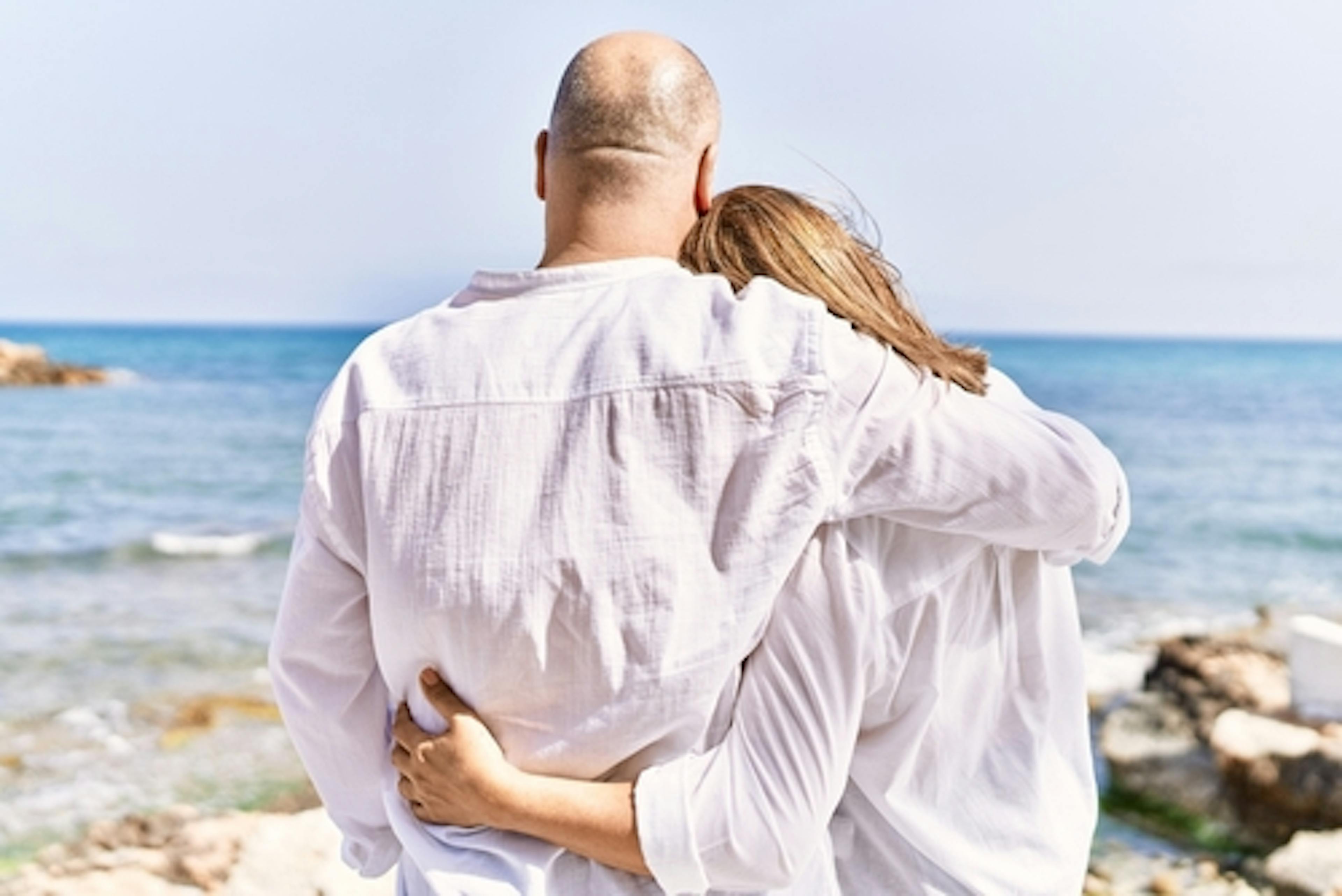 women with bald man in love