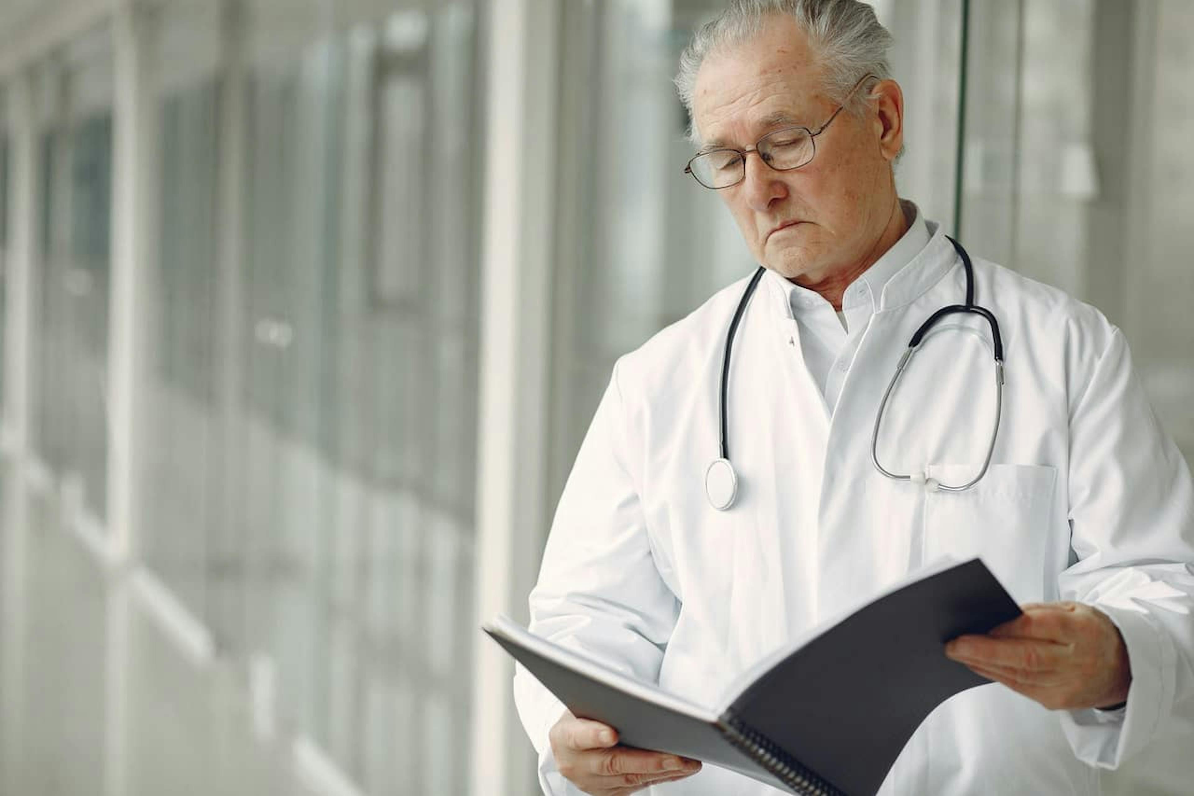 Doctor looking at a patient chart