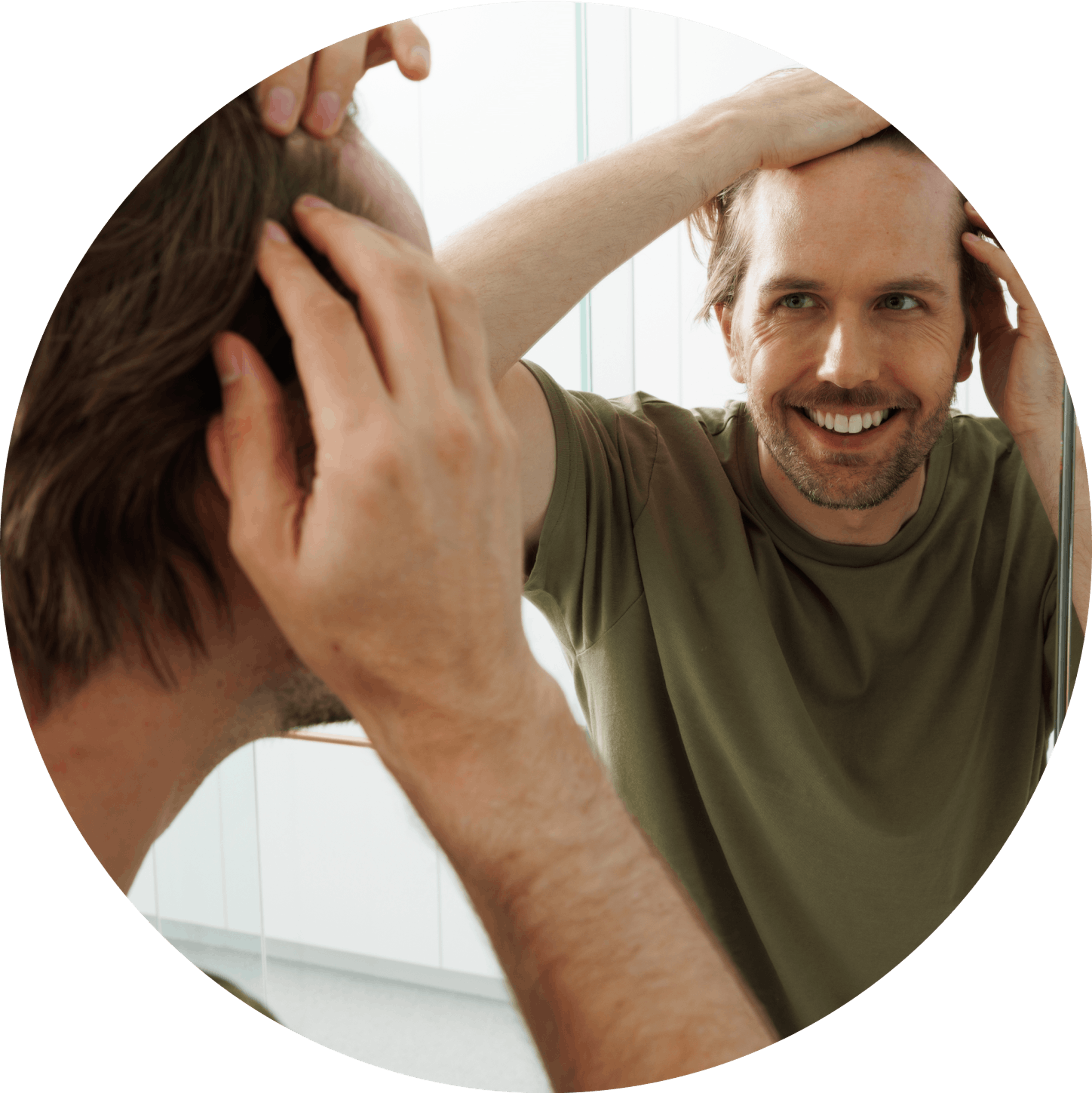 Man noticing hair line in mirror - Mosh