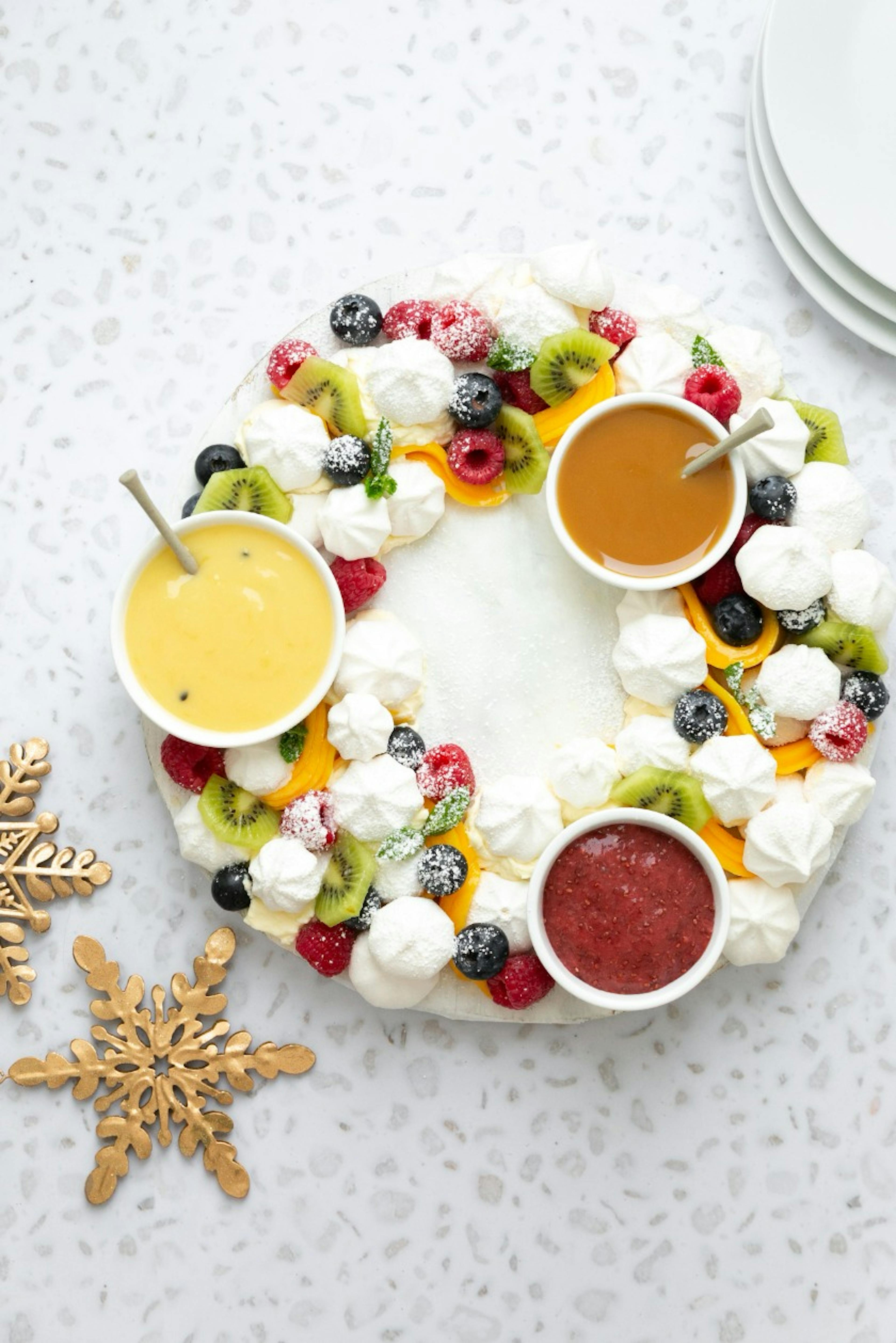 Pavlova Wreath with Decedent Sauces