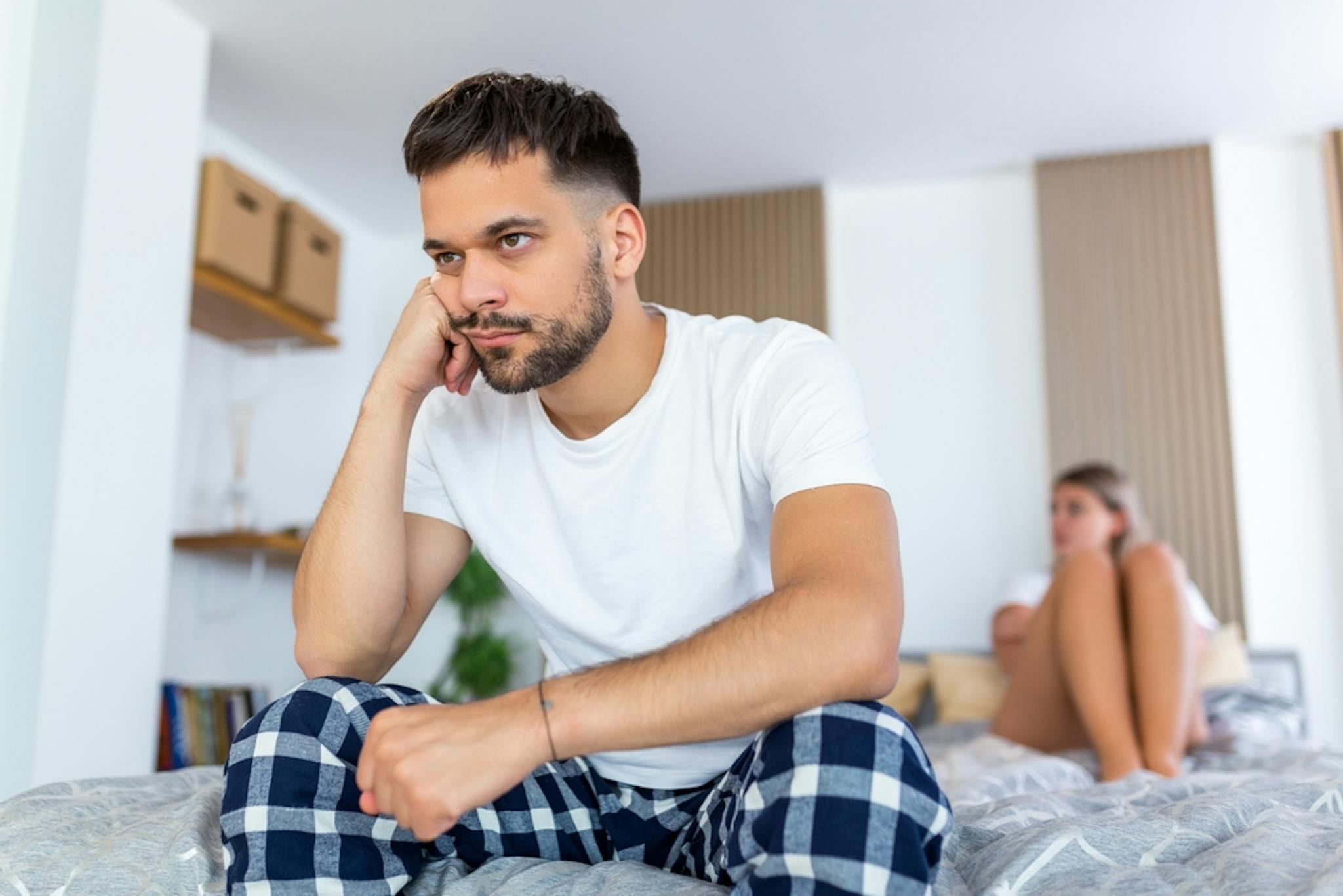very upset male sitting