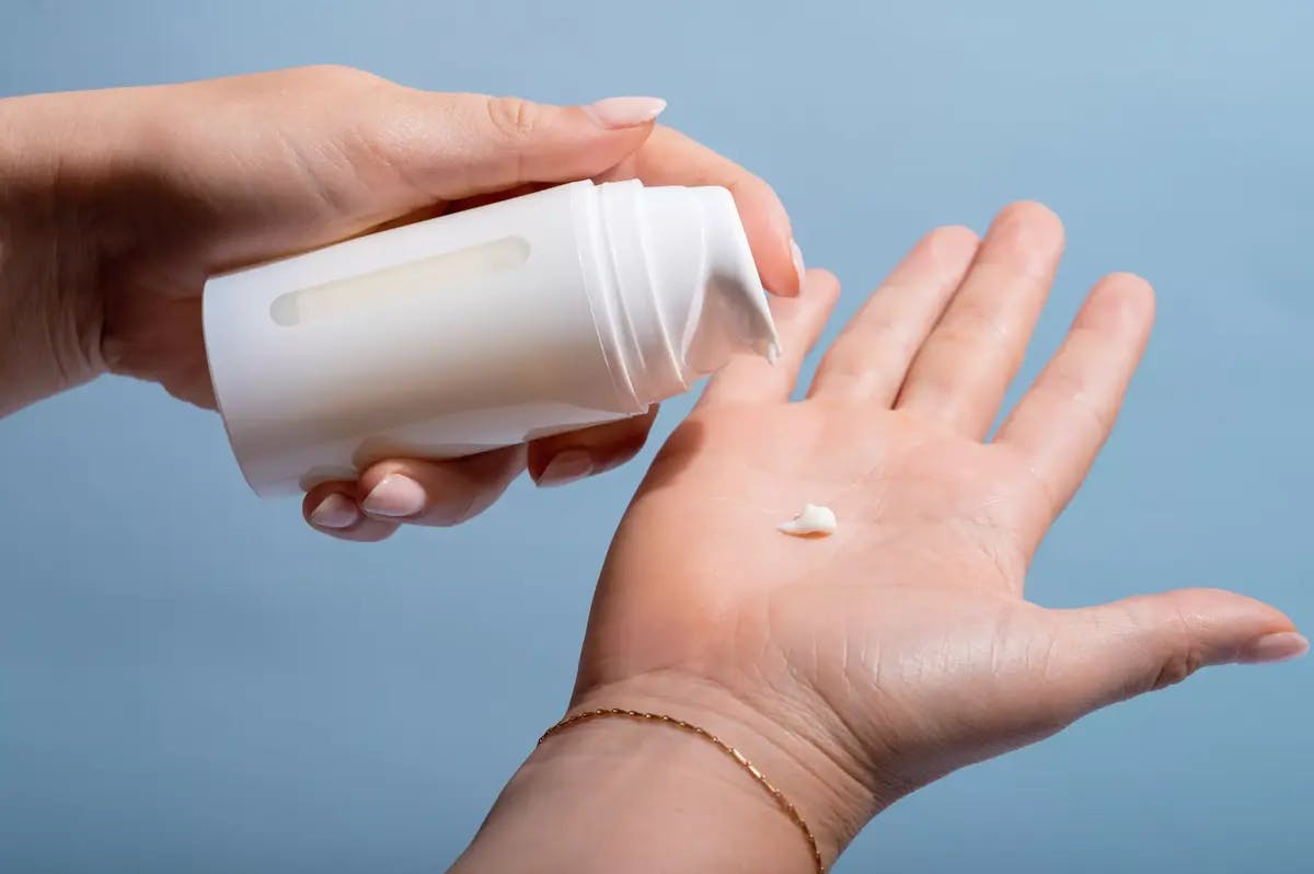 A women about to apply hyaluronic acid products