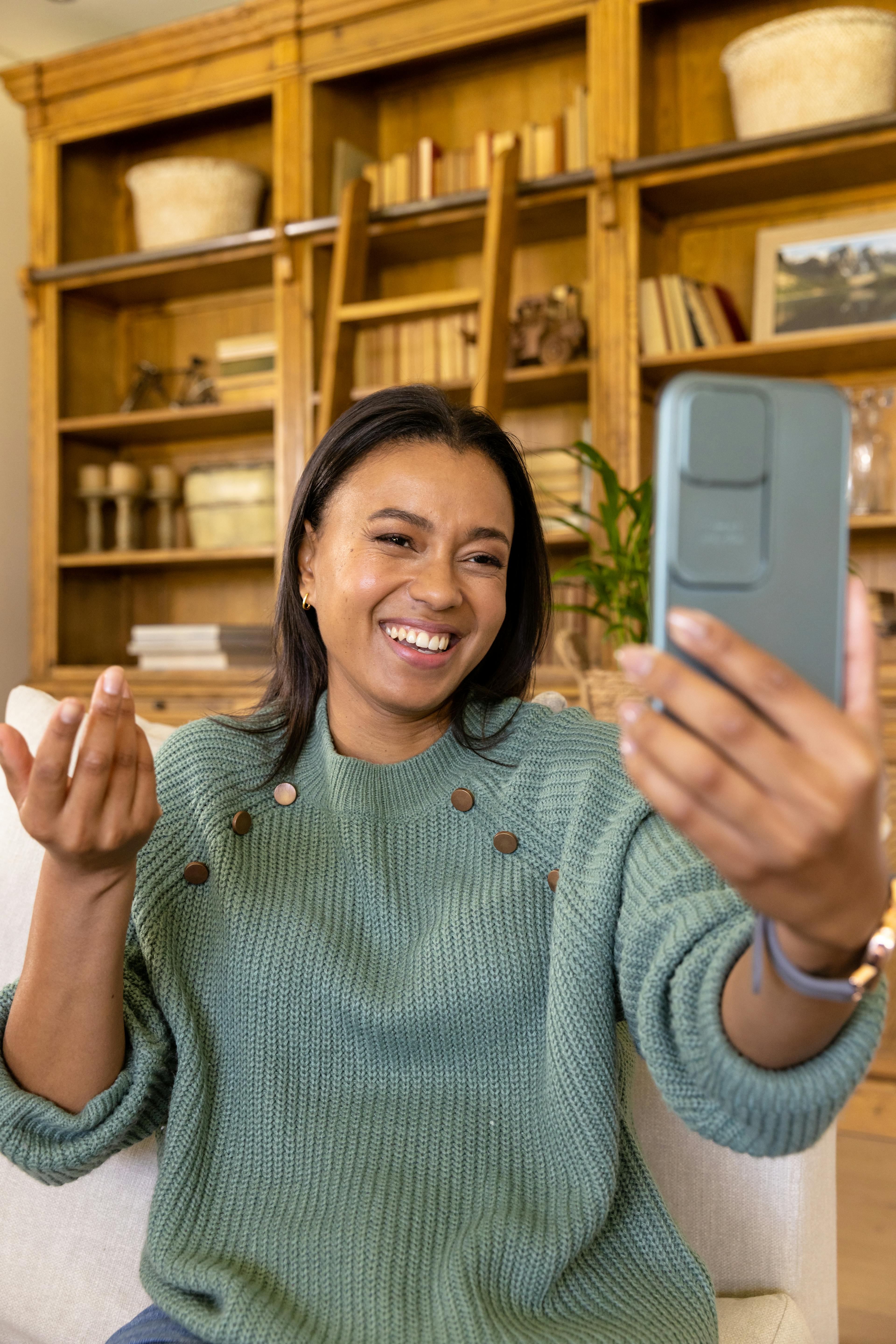 Lady talking on the phone with a video call