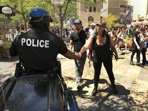 Photo of Police Officer Shaking Hands with Person.