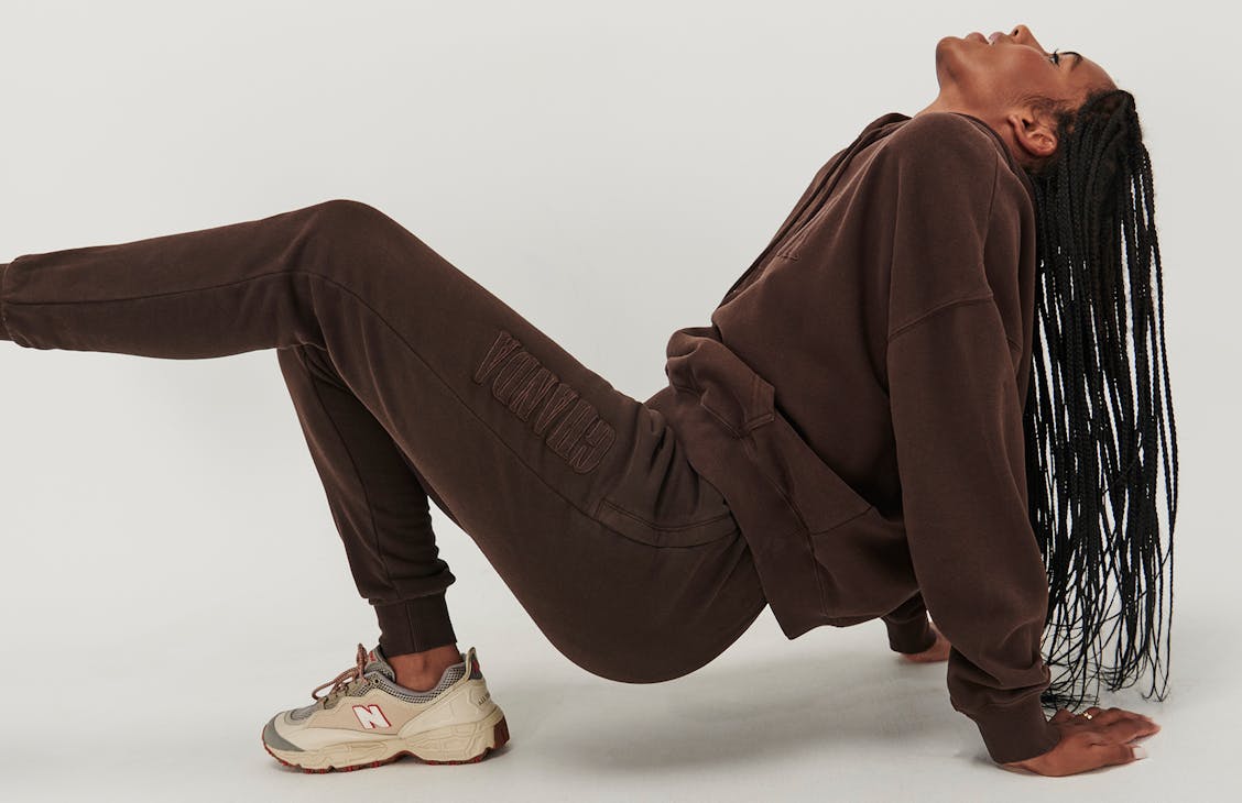 Female model wearing the slim trackies in cacao 