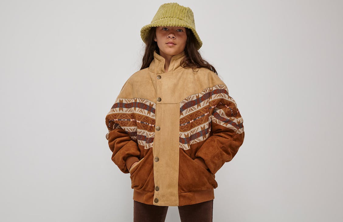 Female model wearing the Yellowstone jacket in Yellowstone.