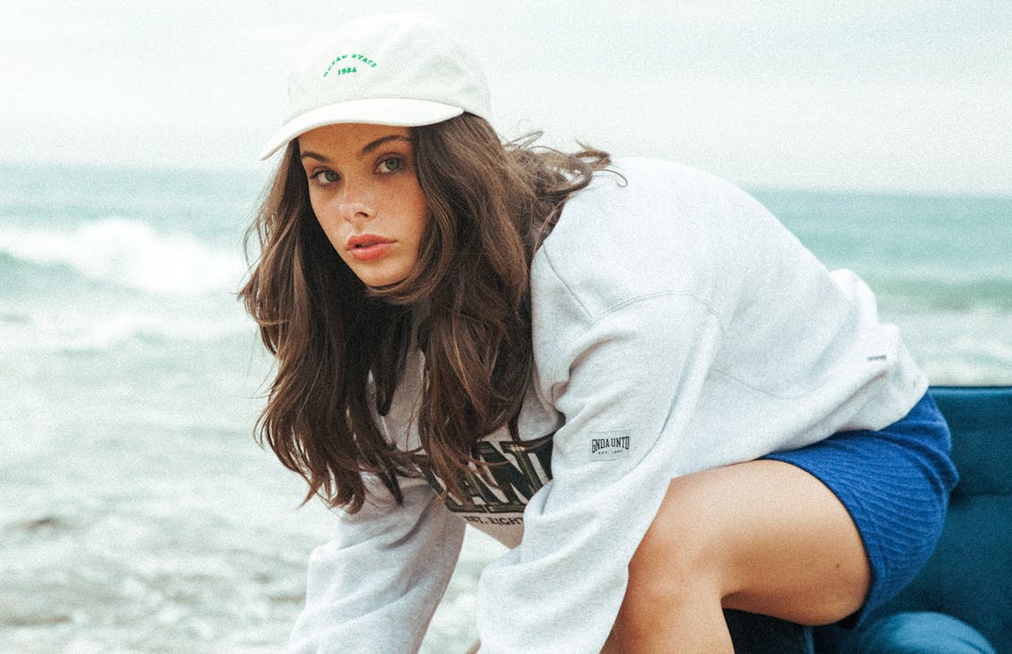 Female model wearing the Oversized Crew in snowmarle