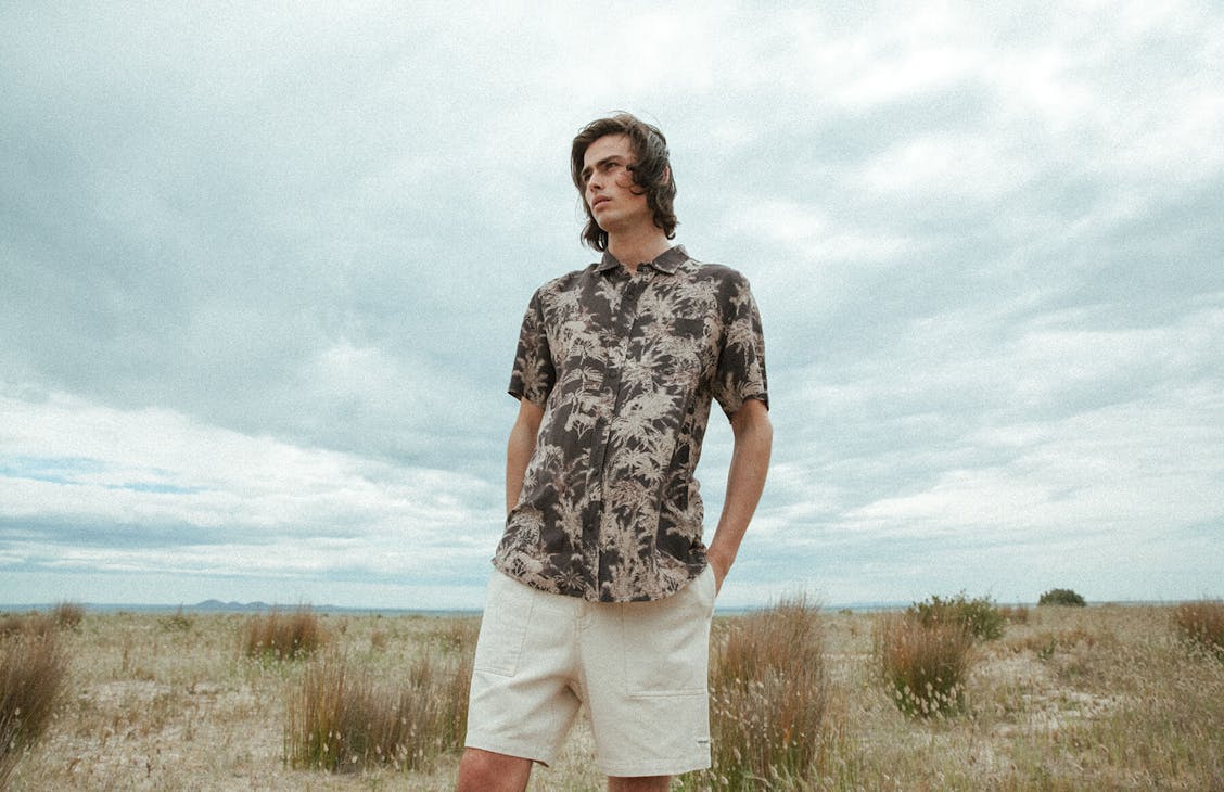 Male model wearing the Byron Shirt in Palms.