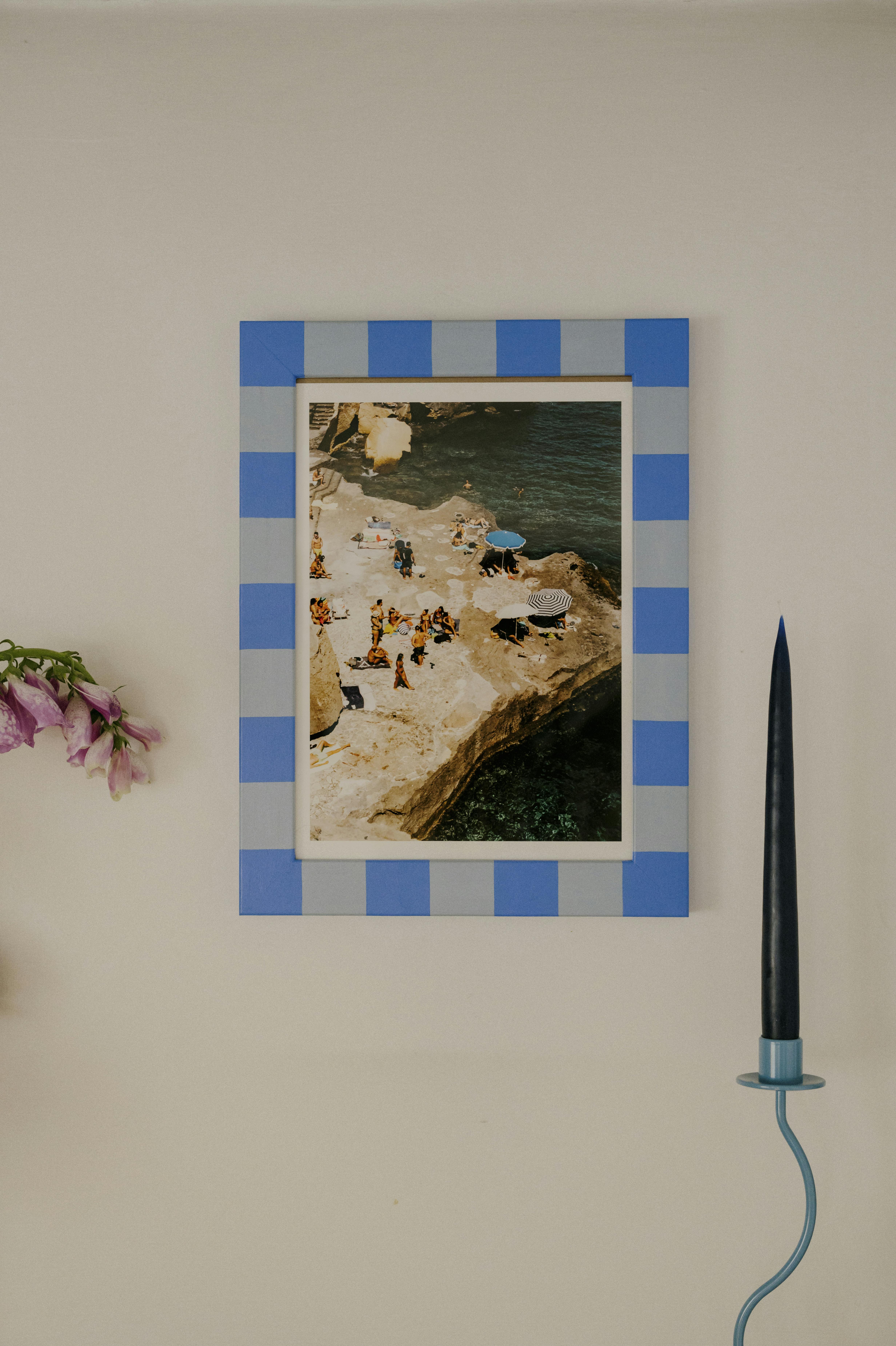 Puglia photographed by Lucy Laucht in the sun, framed in a blue stripe frame