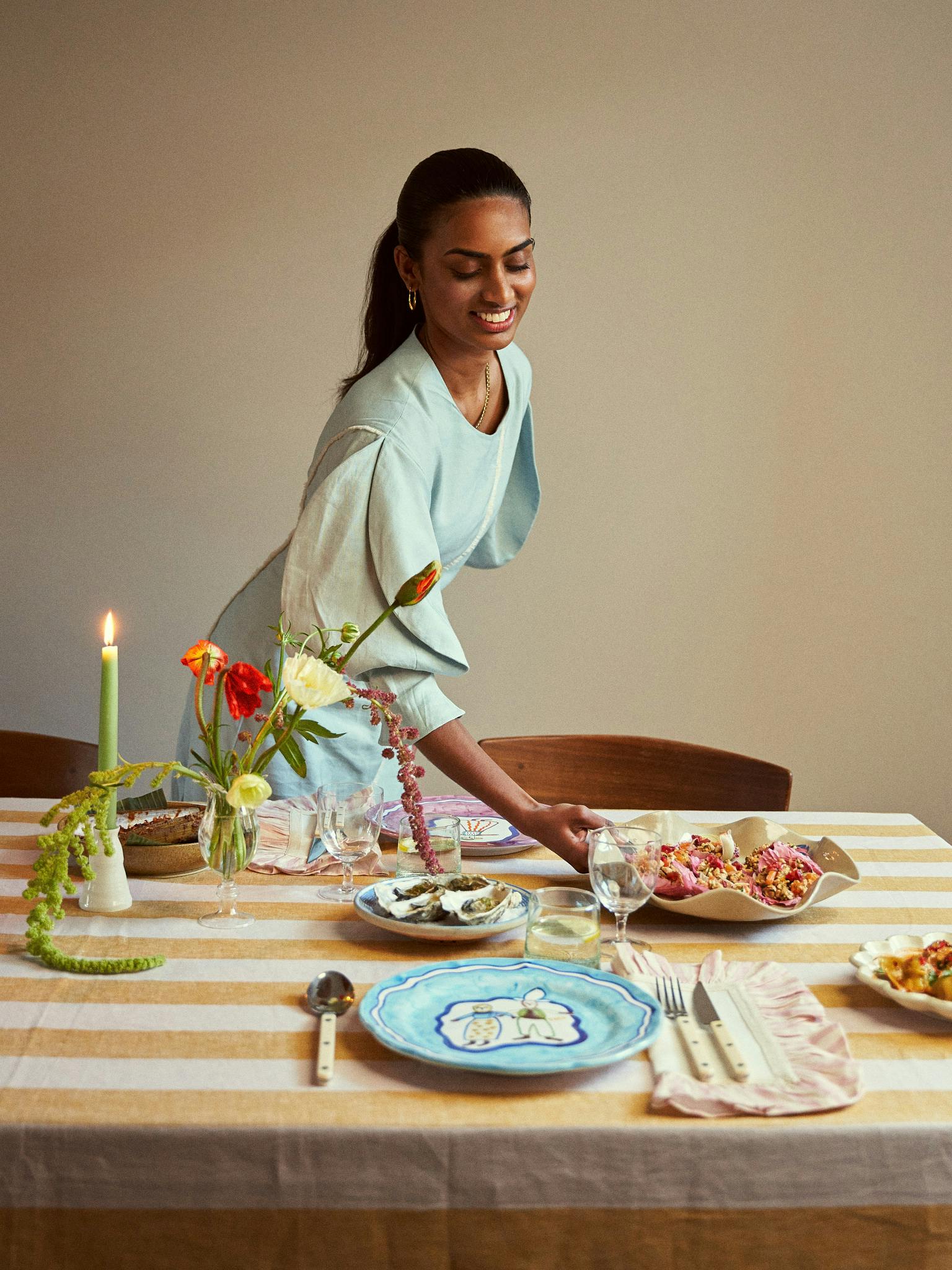 Kirthanaa at her dining table