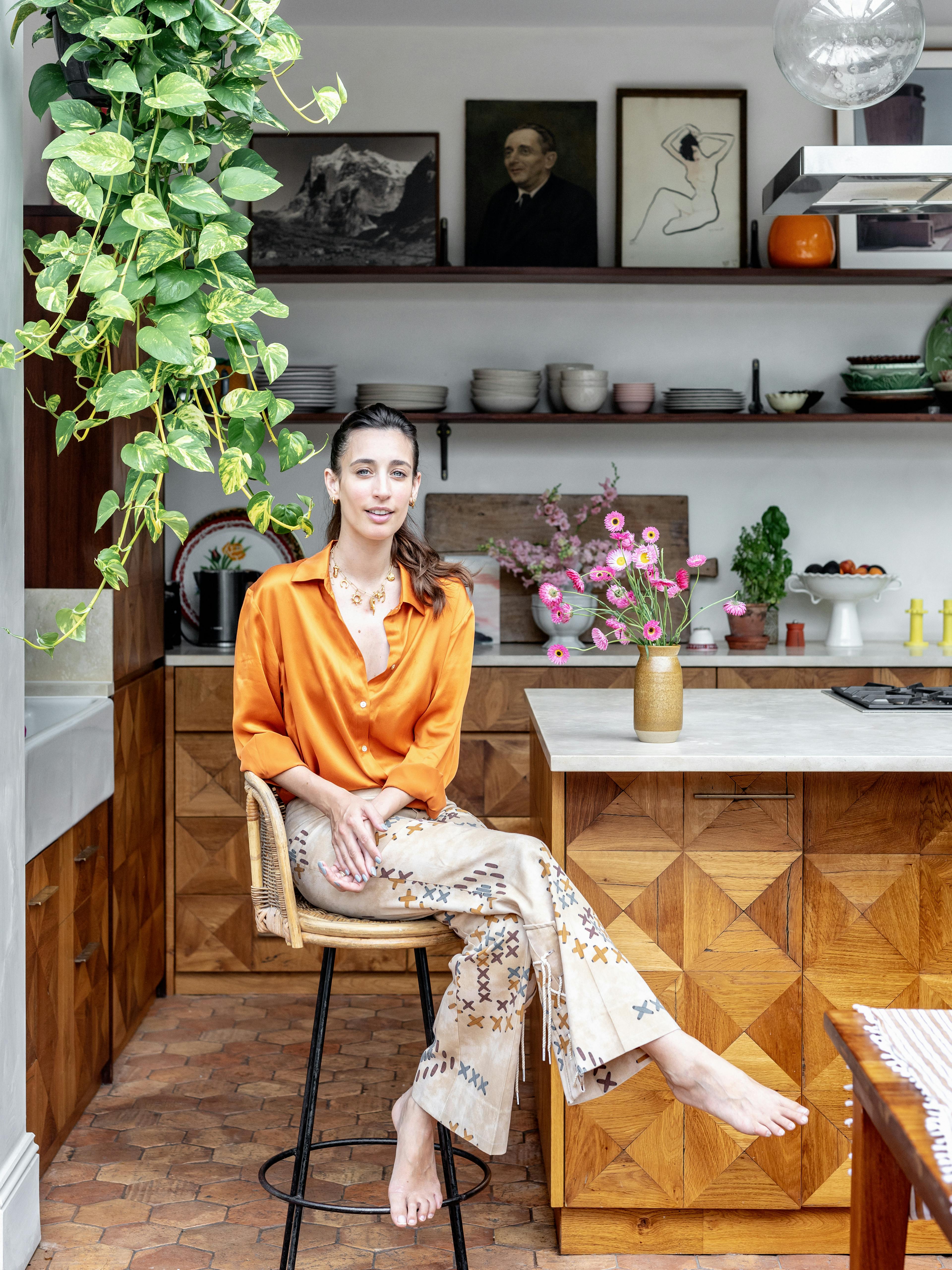 Laura Jackson seated in her kitchen