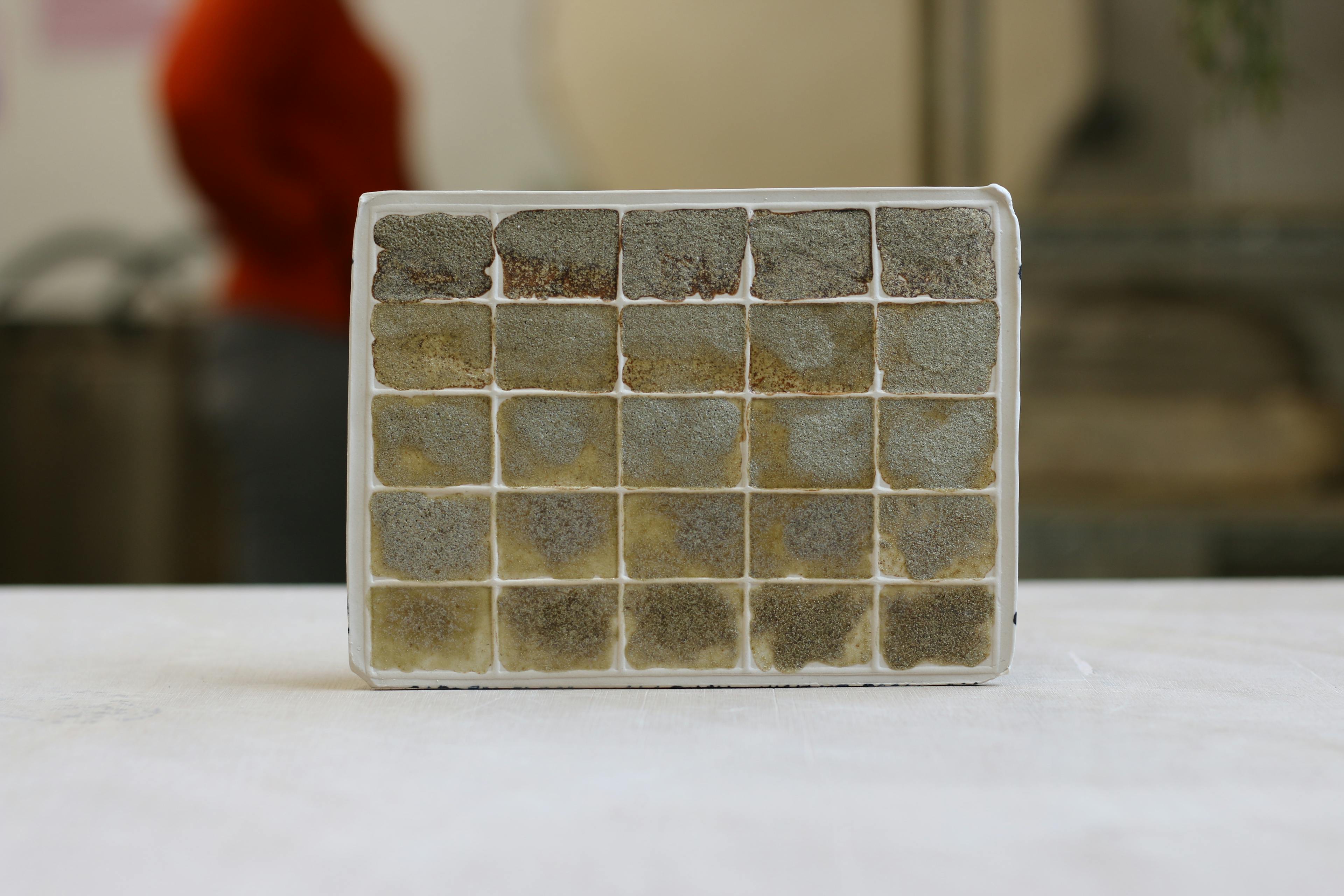 An image showing a flat slab tile with a ceramic glaze blend by Steven Sales. 