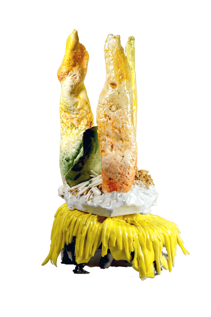 An image showing a ceramic sculpture by Julie Ellen Lancaster. Bright yellow fringe as well as expremintal glaze surface is striking.