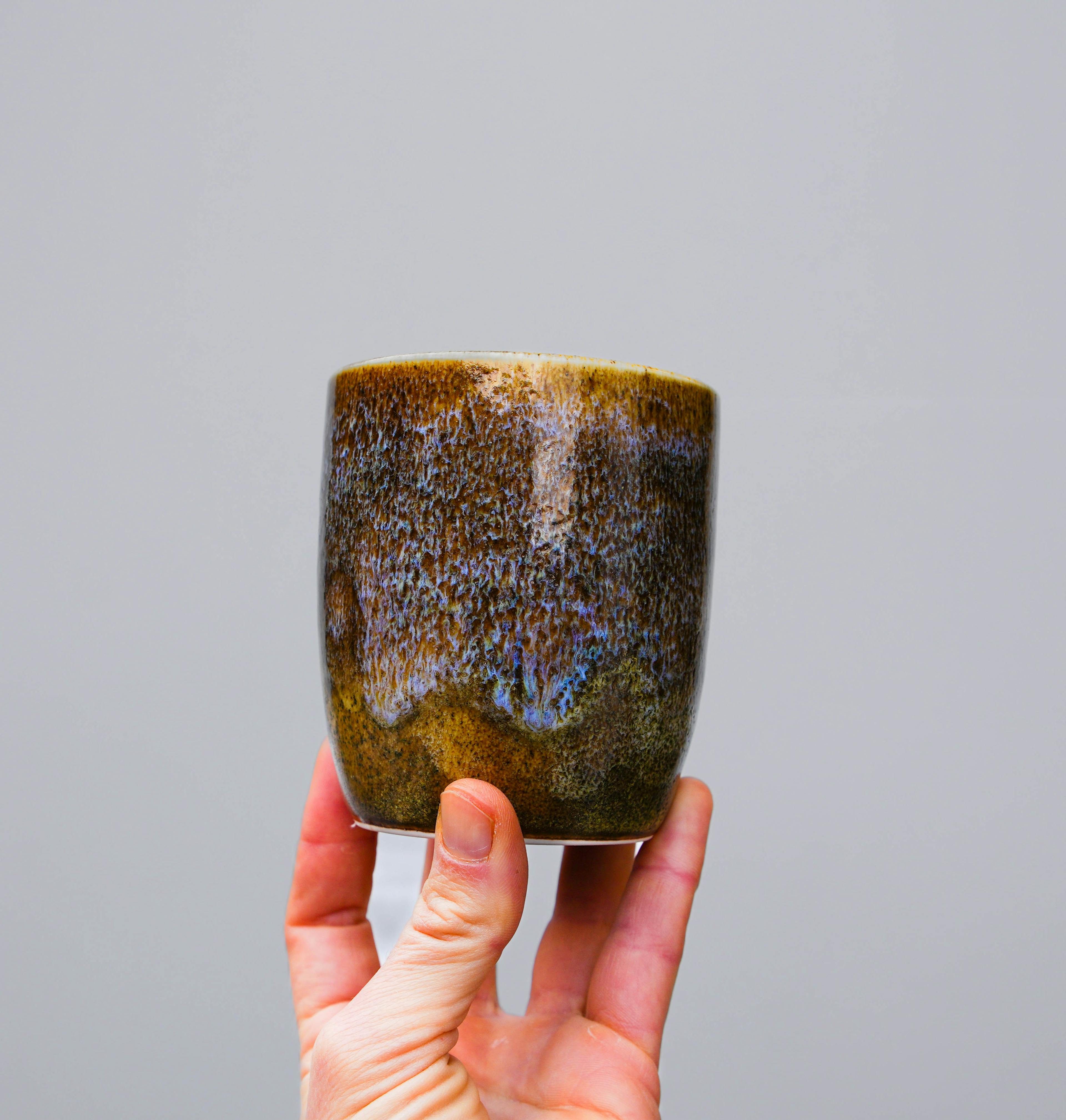 Layered combination of GLOST glazes on a cup