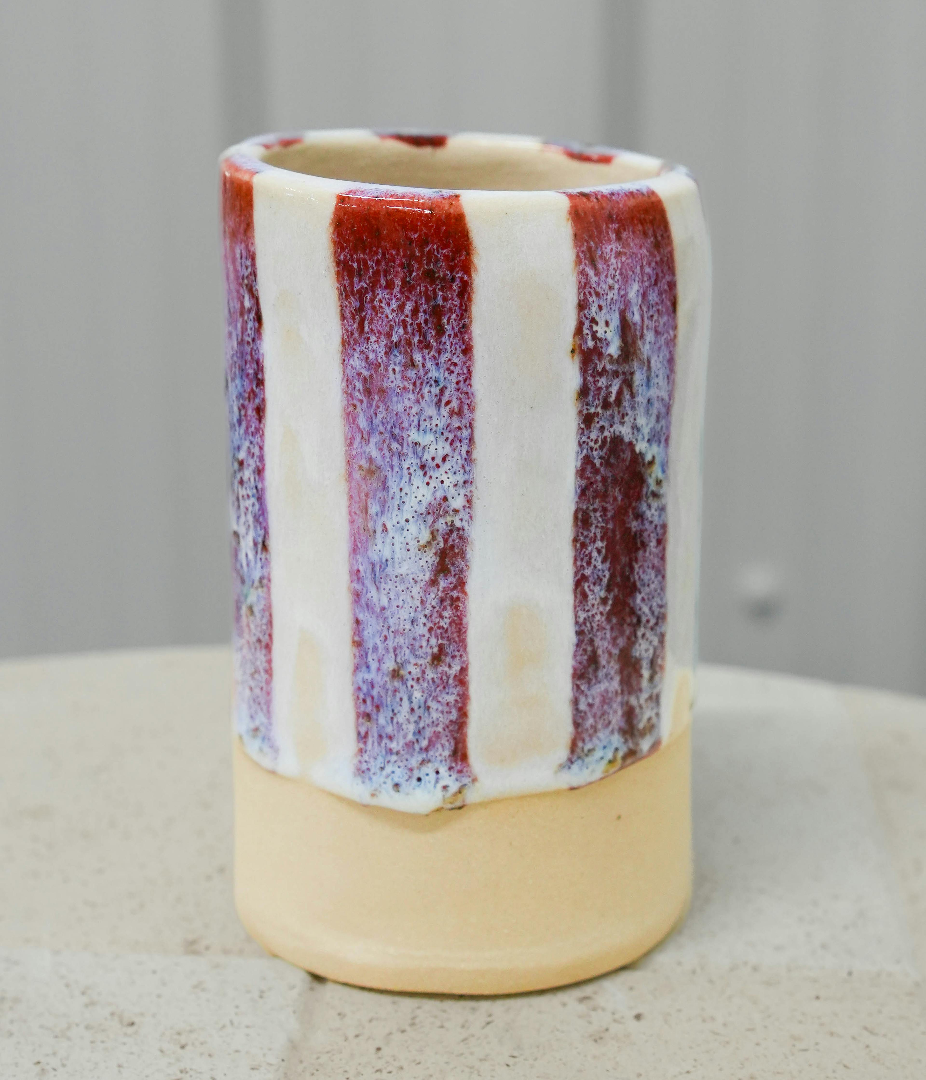Layered combination of GLOST glazes on a cylinder