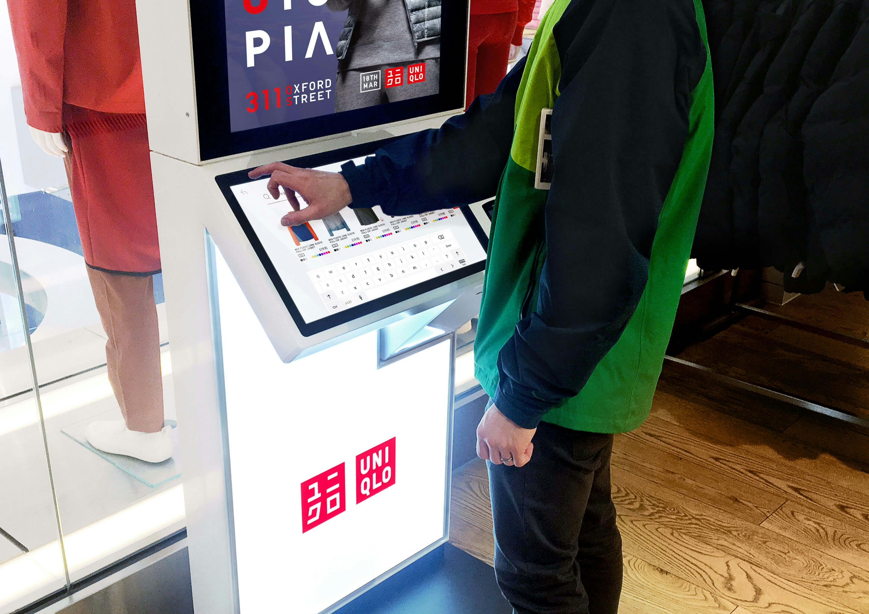 A customer using the Uniqlo in-store digital kiosk - Glue