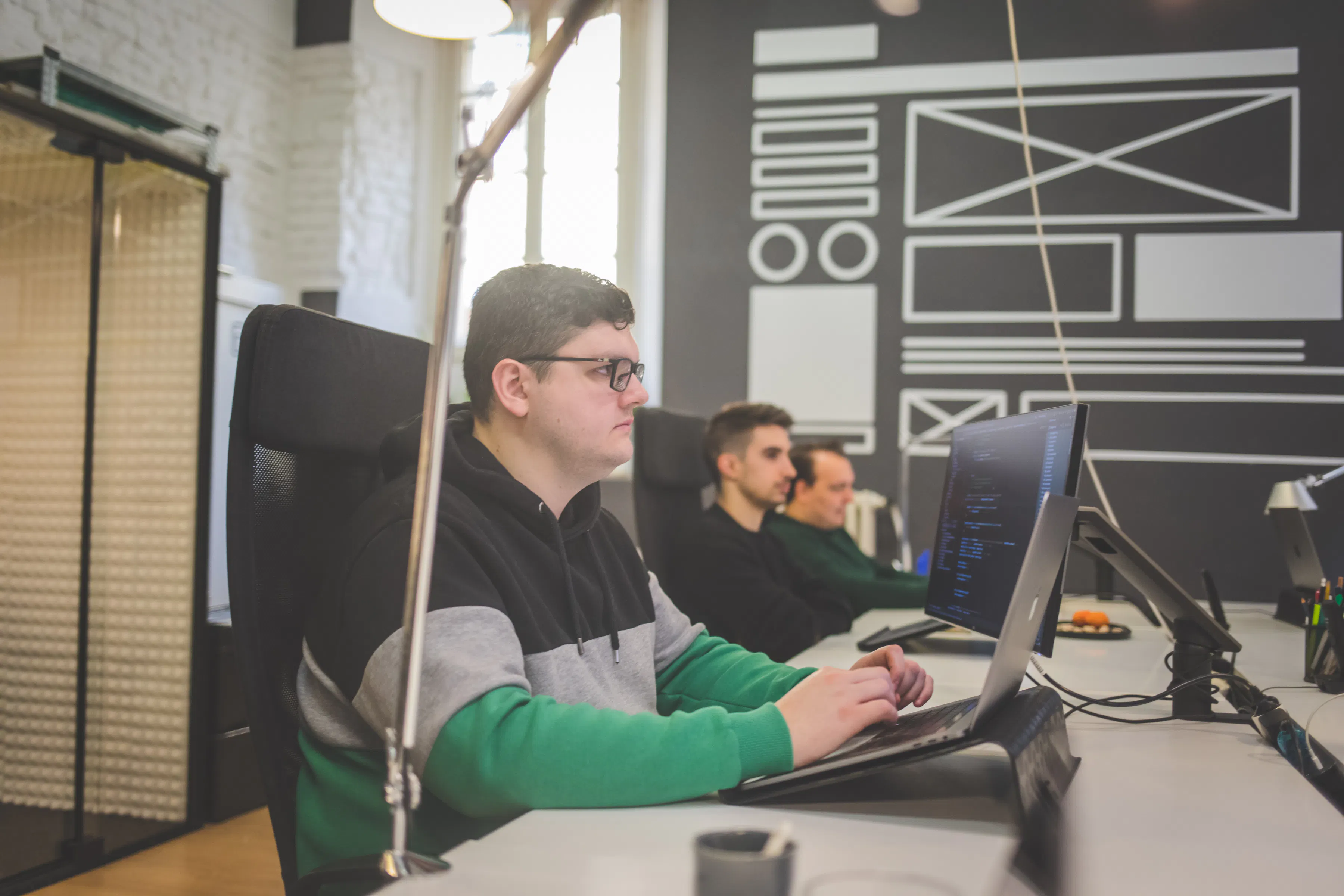 GlueGlue development team working on app maintenance