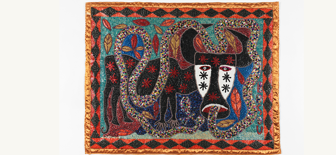 An intricate beaded tapestry with images of a bull and snakes