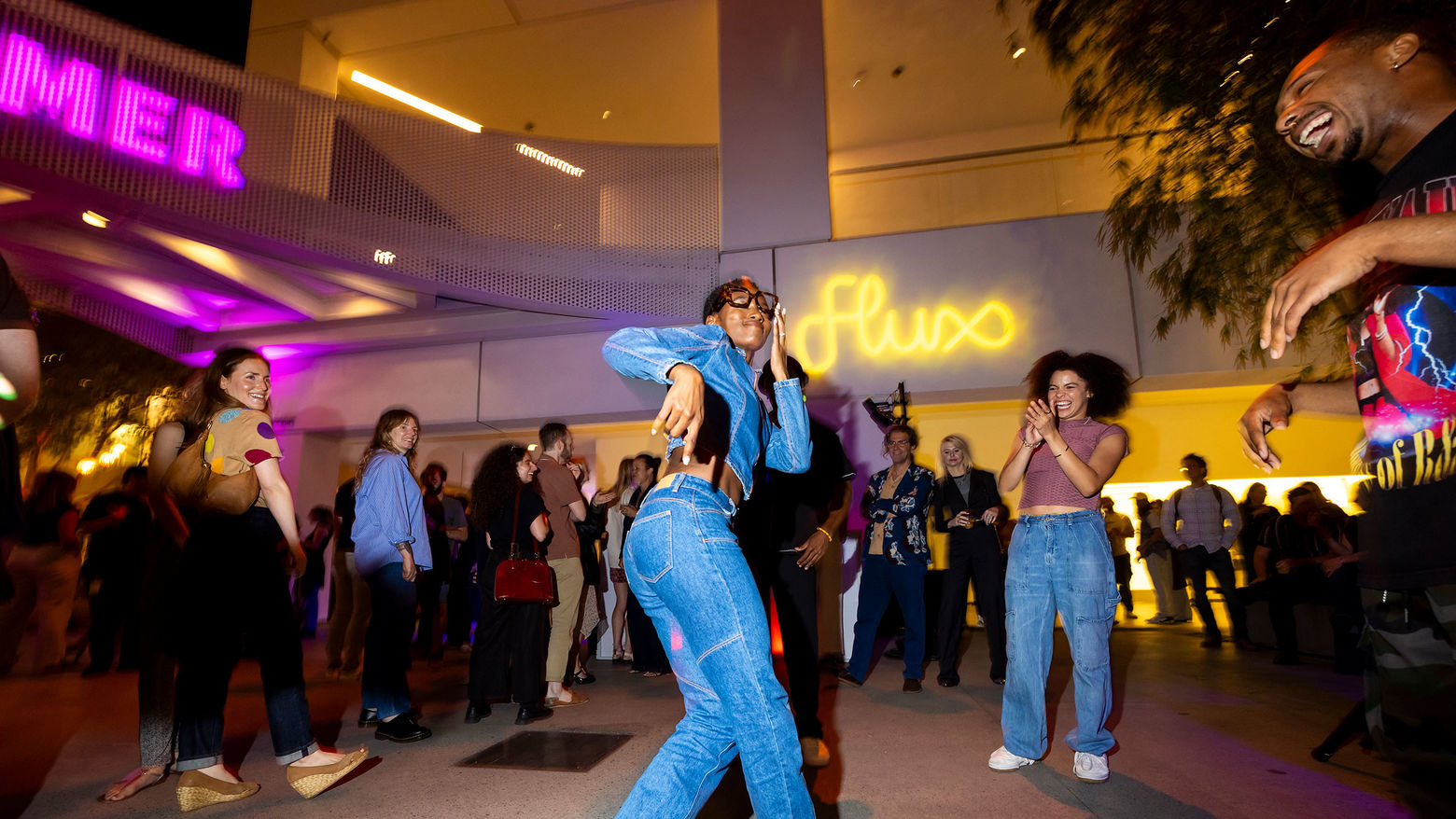 People dance in the courtyard of the Hammer Museum
