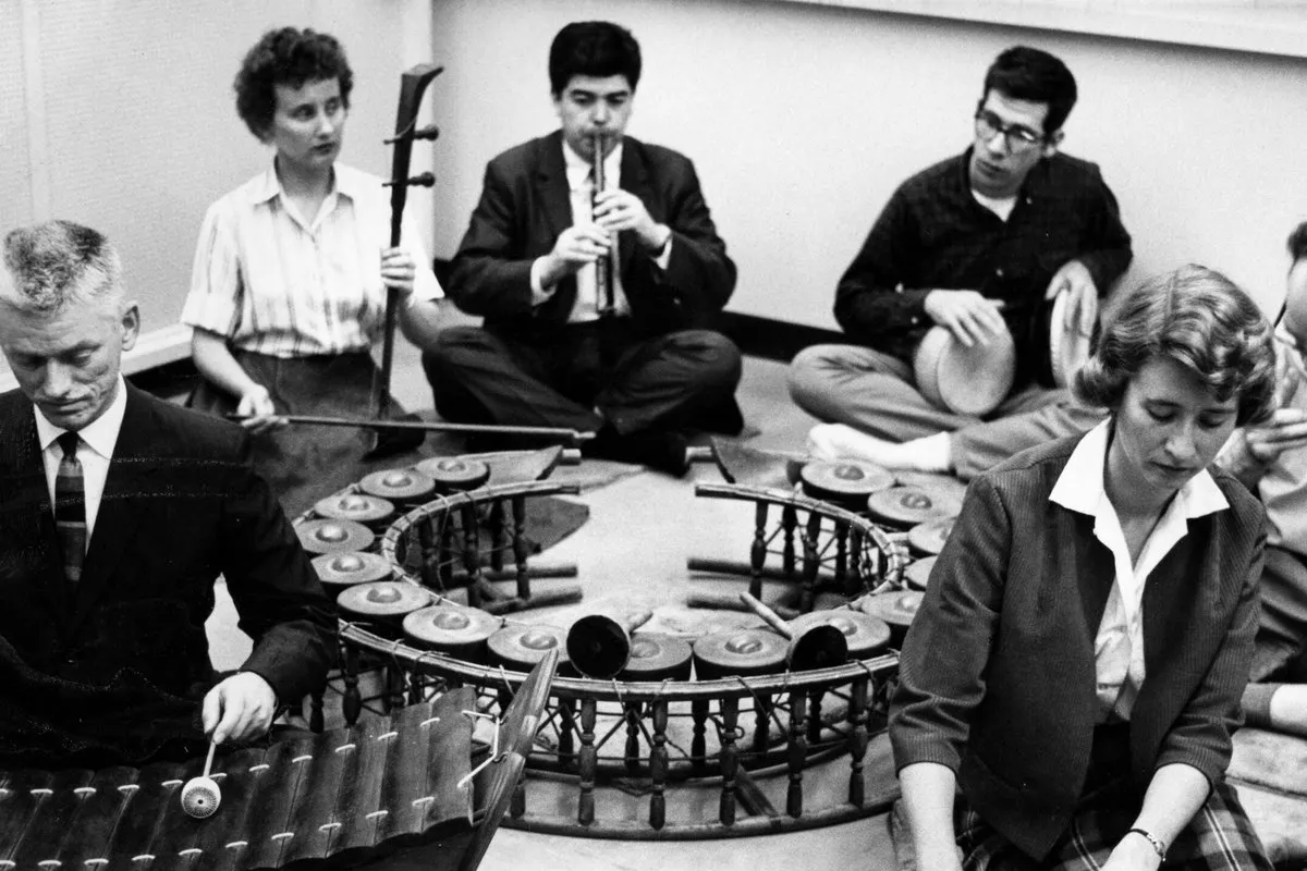 A historic image of performers on a variety of instruments