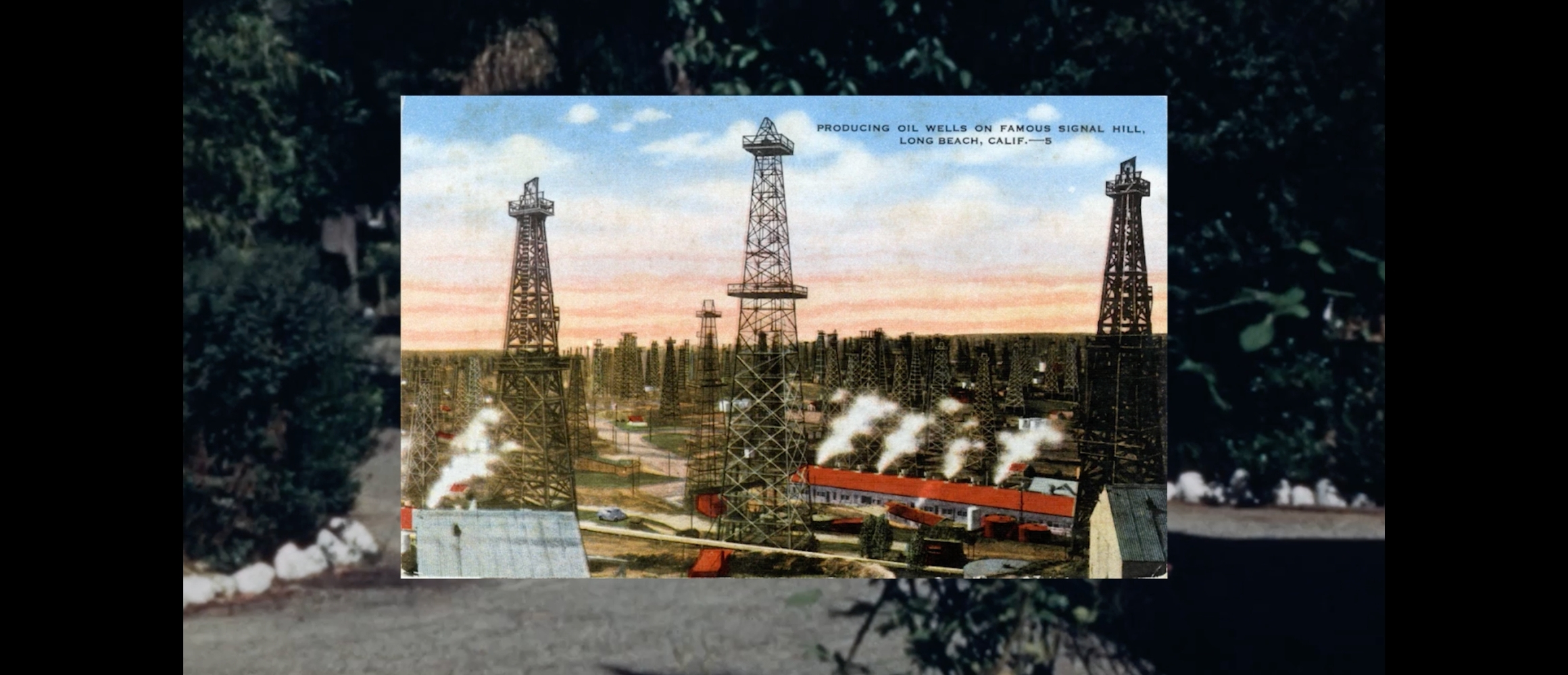 postcard of three oil wells