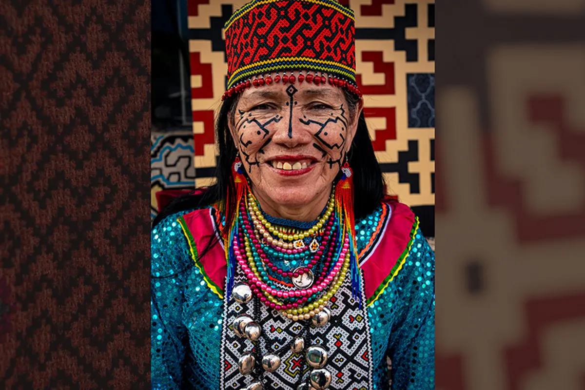 Closeup of artist Olinda Silvano, she is wearing traditional Shipibo-Konibo garb and facial markings