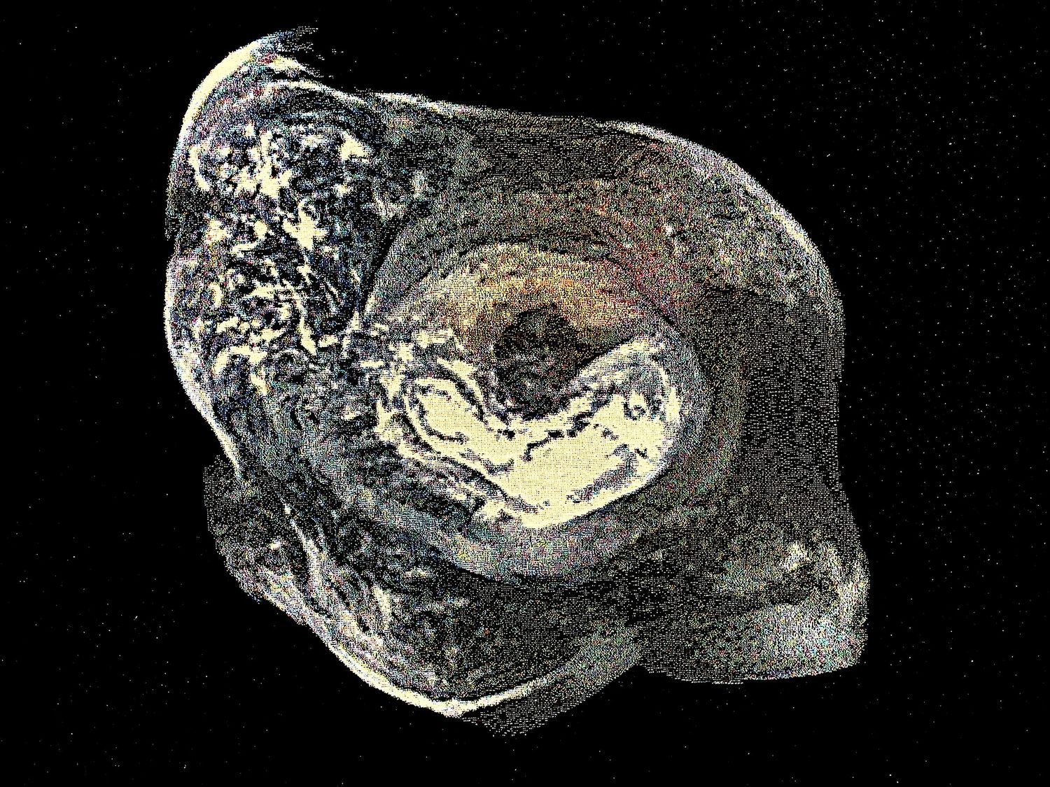 A swirling nexus shape of greys and gold and white on a black surface....a work titled Exit Point by weaver Sarah Rosalena