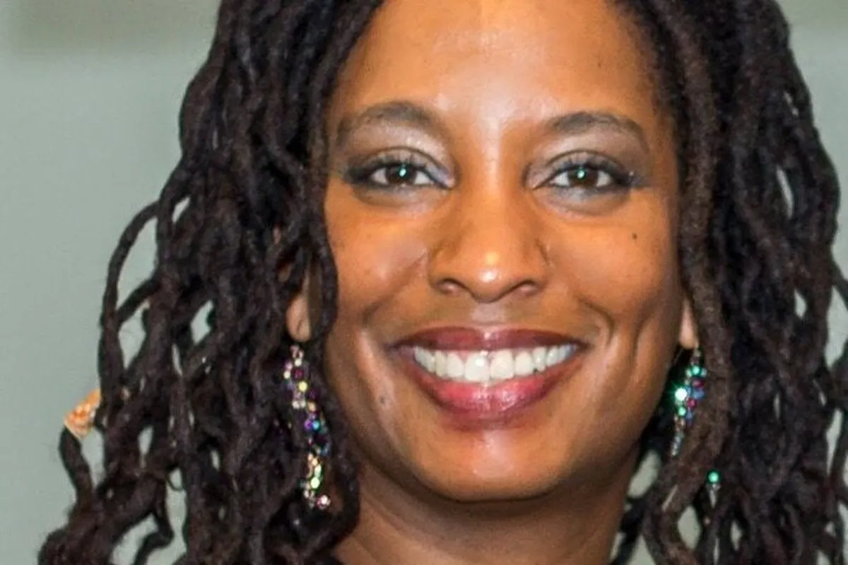 Portrait of Dawn Norfleet. She is smiling