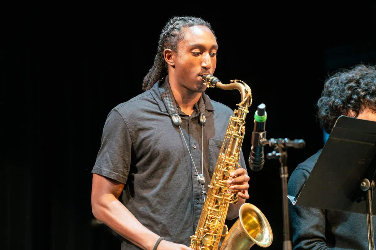 A sax player performs a solo