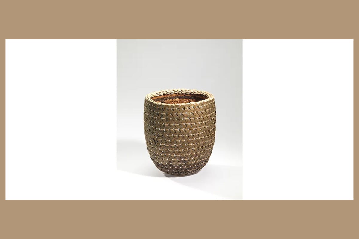 Image of a tuo (ceremonial container), mid- 20th century, made from vegetable fiber, cowrie shells, foil and coins