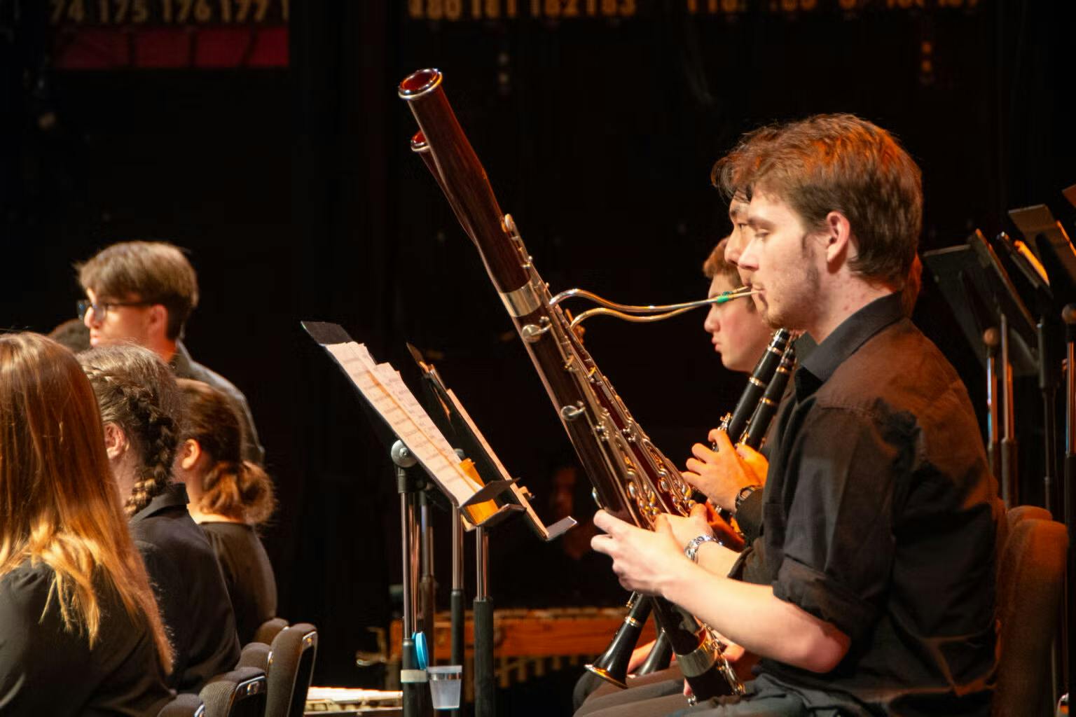 Student playing the bassoon during a concert.