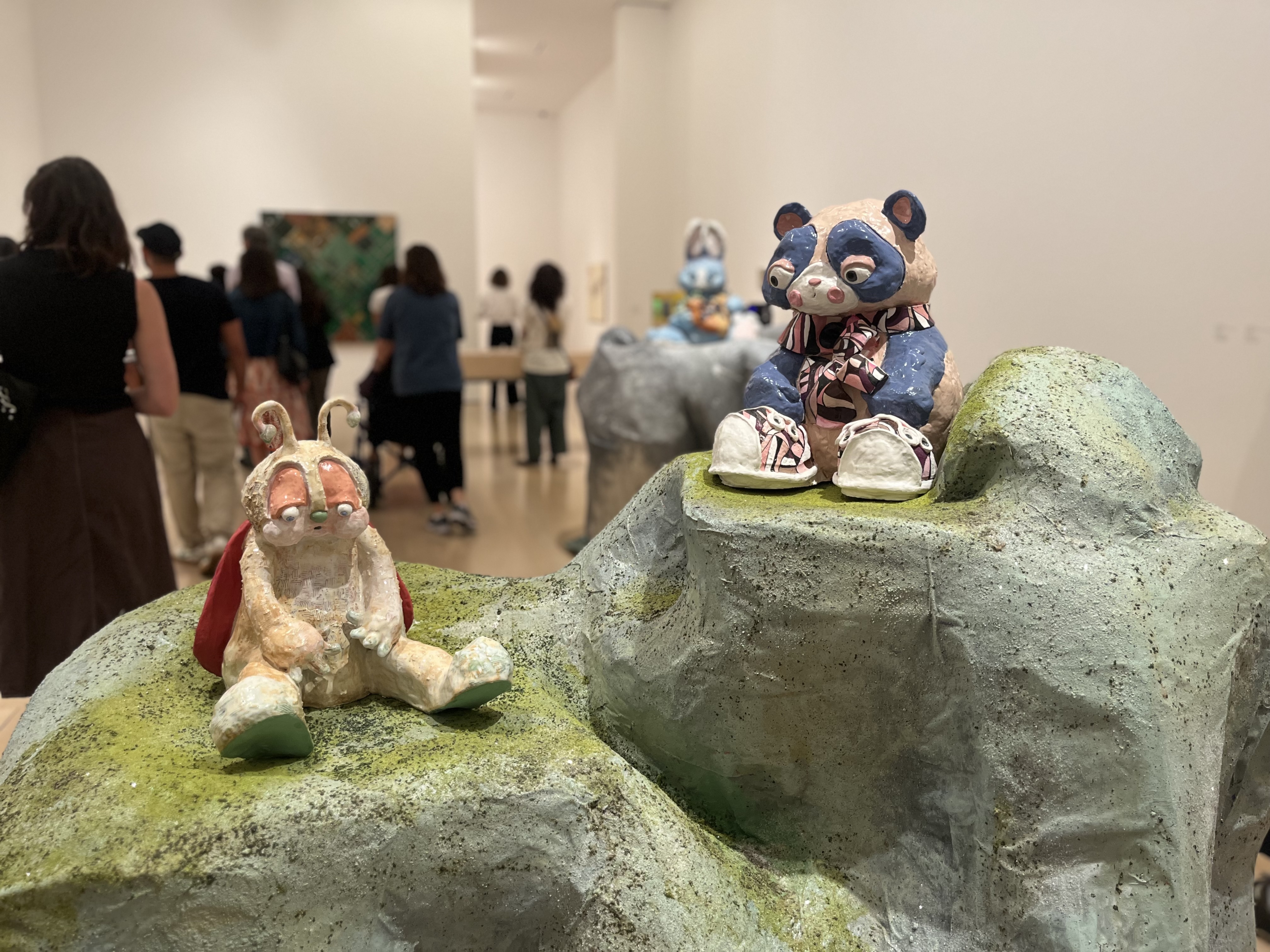 Ceramic work by artist Alake Shilling in the Hammer Museum, a ceramic tortise and panda sit forlornly on a rock surface