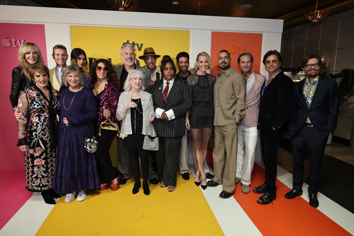 Stars from the TV show Palm Royale Pose together