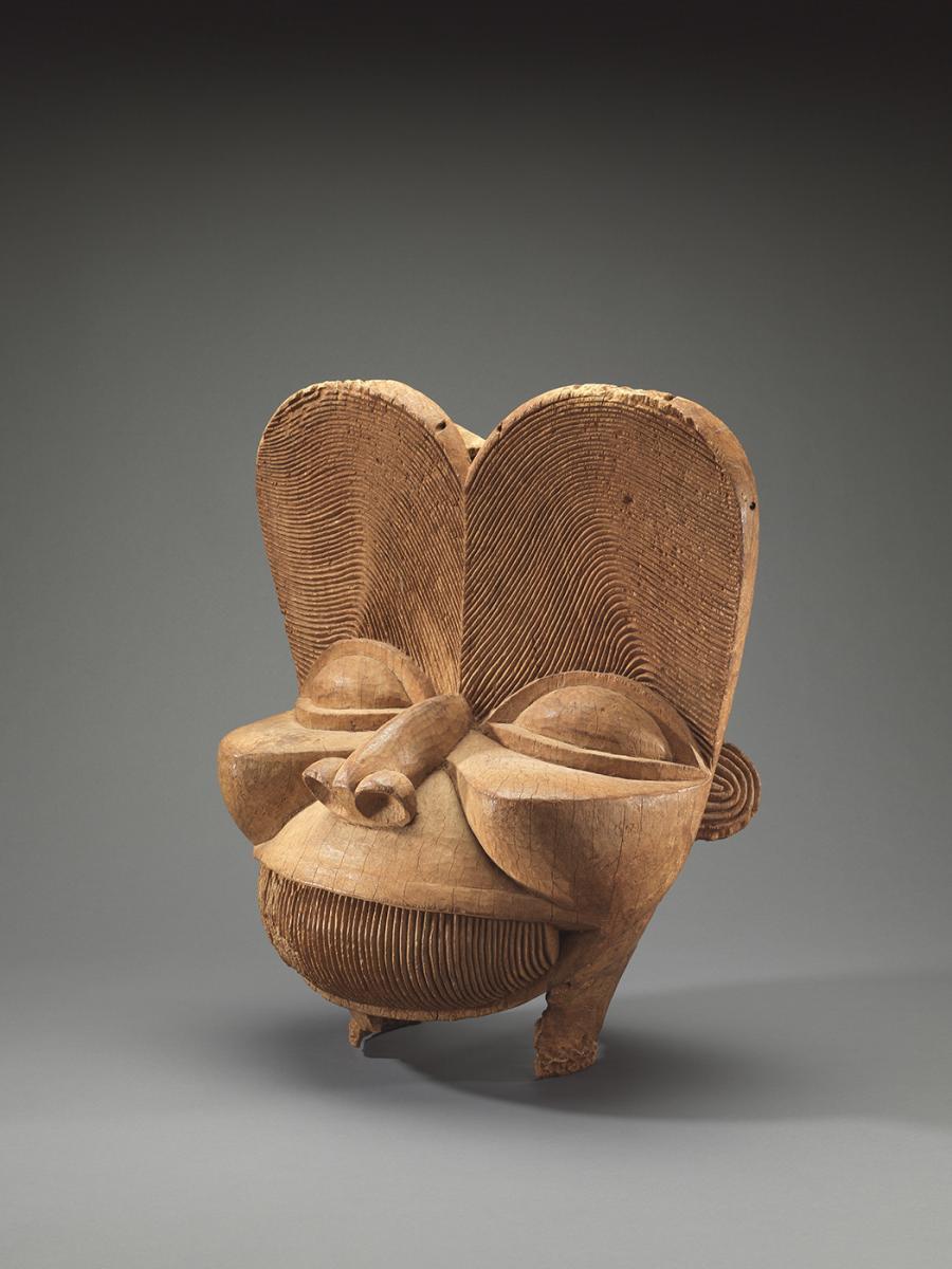 Photo of an intricately carved wooden mask from Africa