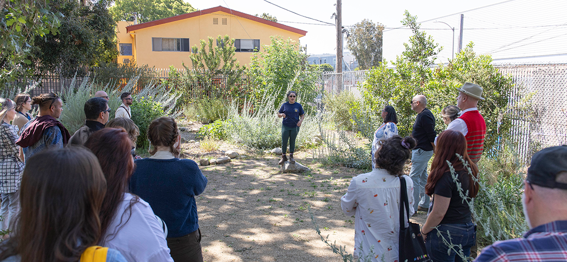 A group of people visit Kuruvunga Springs