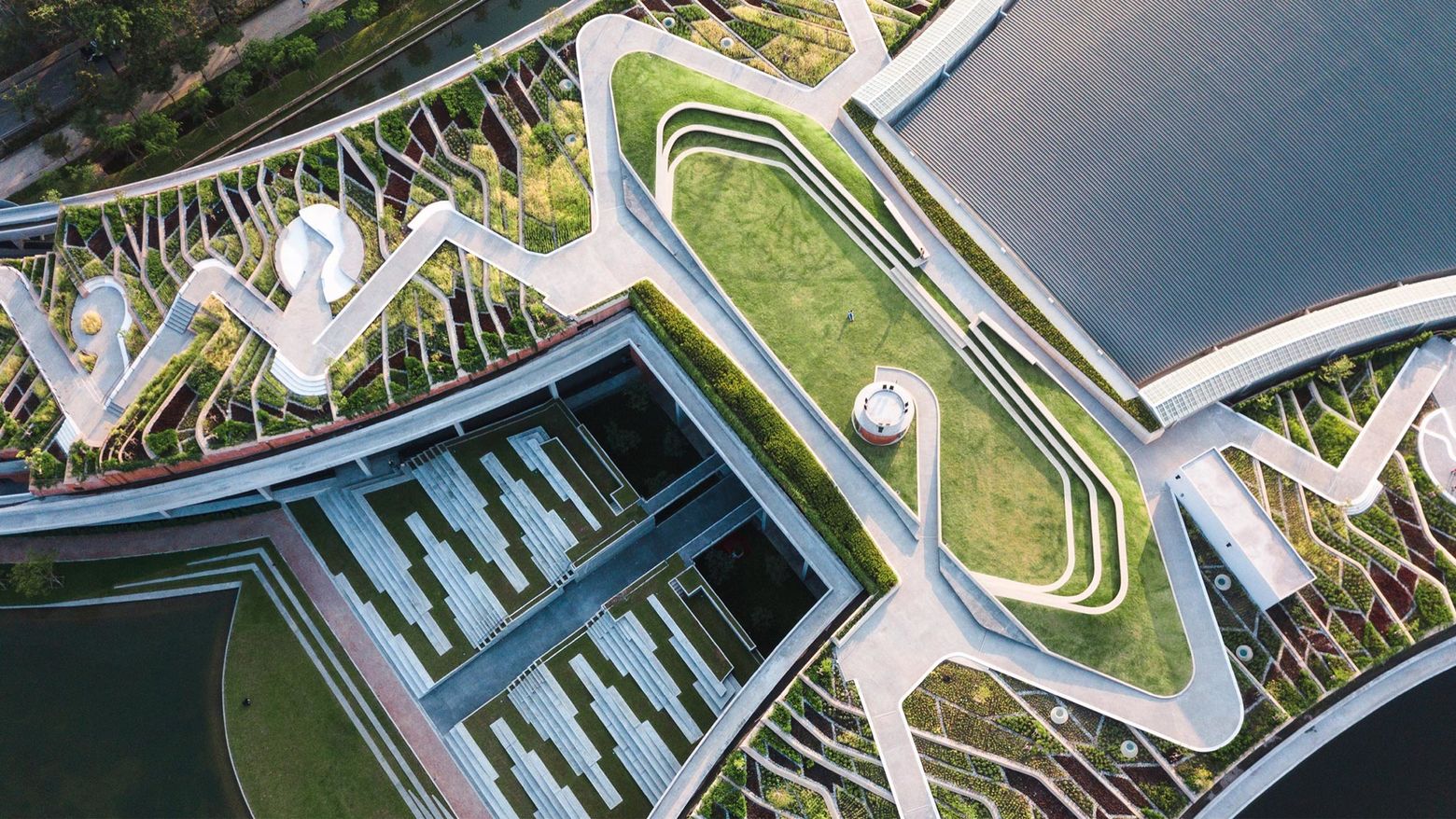 Arial view of an intricately designed architecture with gardens and footpaths