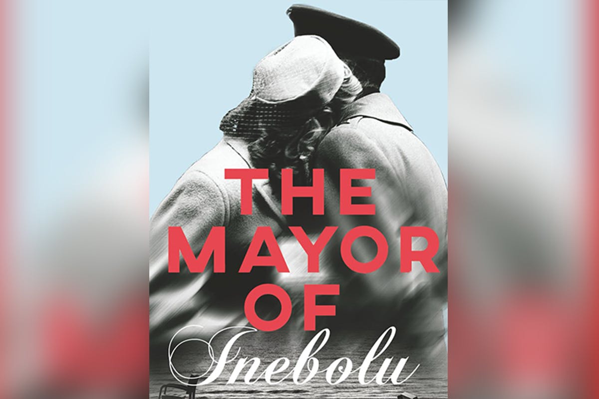 Book cover for The Mayor of Inebolu. a couple embraces, faces turned away from the camera