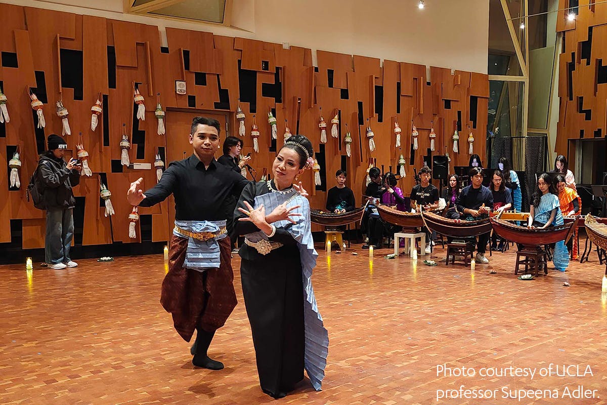 Dancers in colorful garb perform