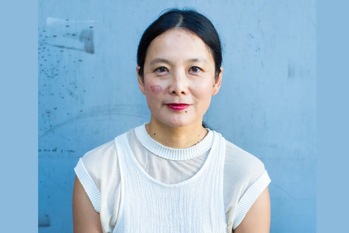 Portrait of Anna Sew Hoy, she is looking at the camera