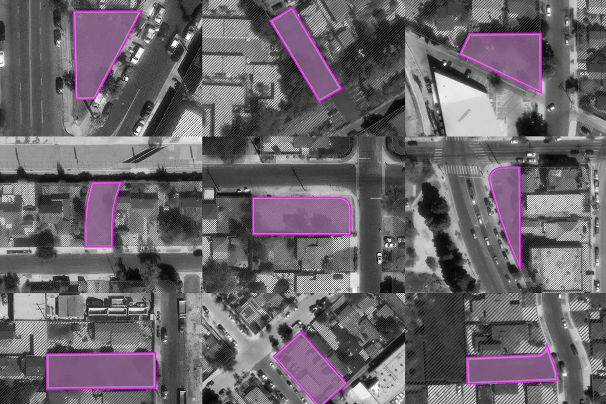 A grey overhead map of a section of Los Angeles is punctuated by pink squares that show potential building sites.